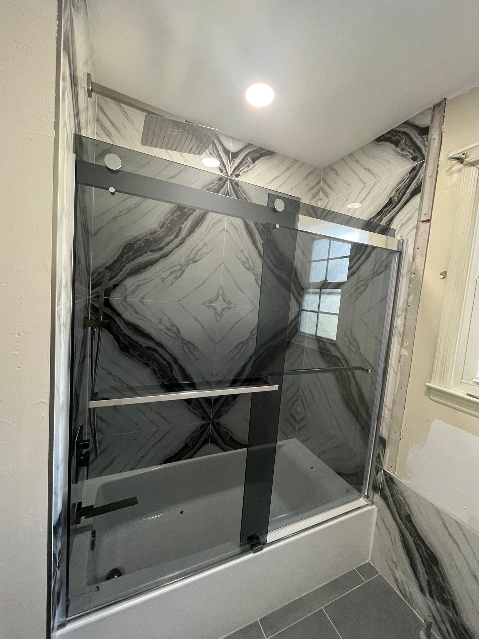 Bathroom Remodel using Tile by Home Concepts Construction