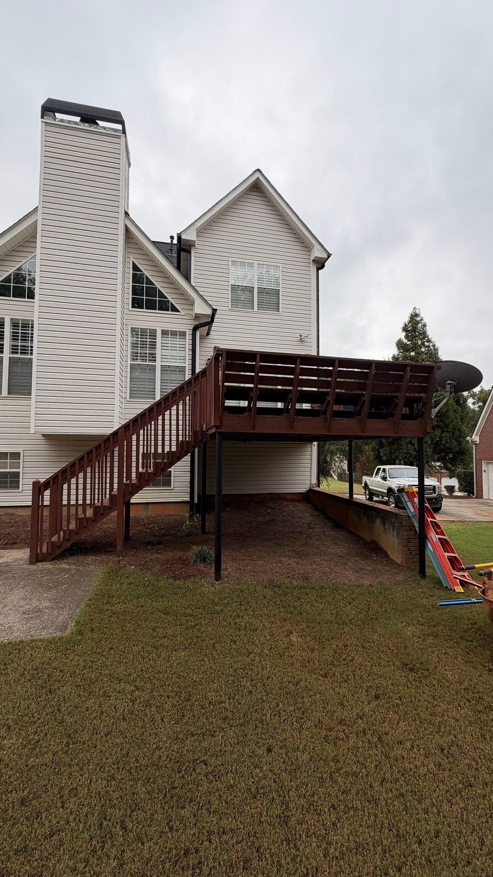 Elevated Pressure-Treated Deck and Staircase Rebuild in Douglasville by Swift Home Renovations