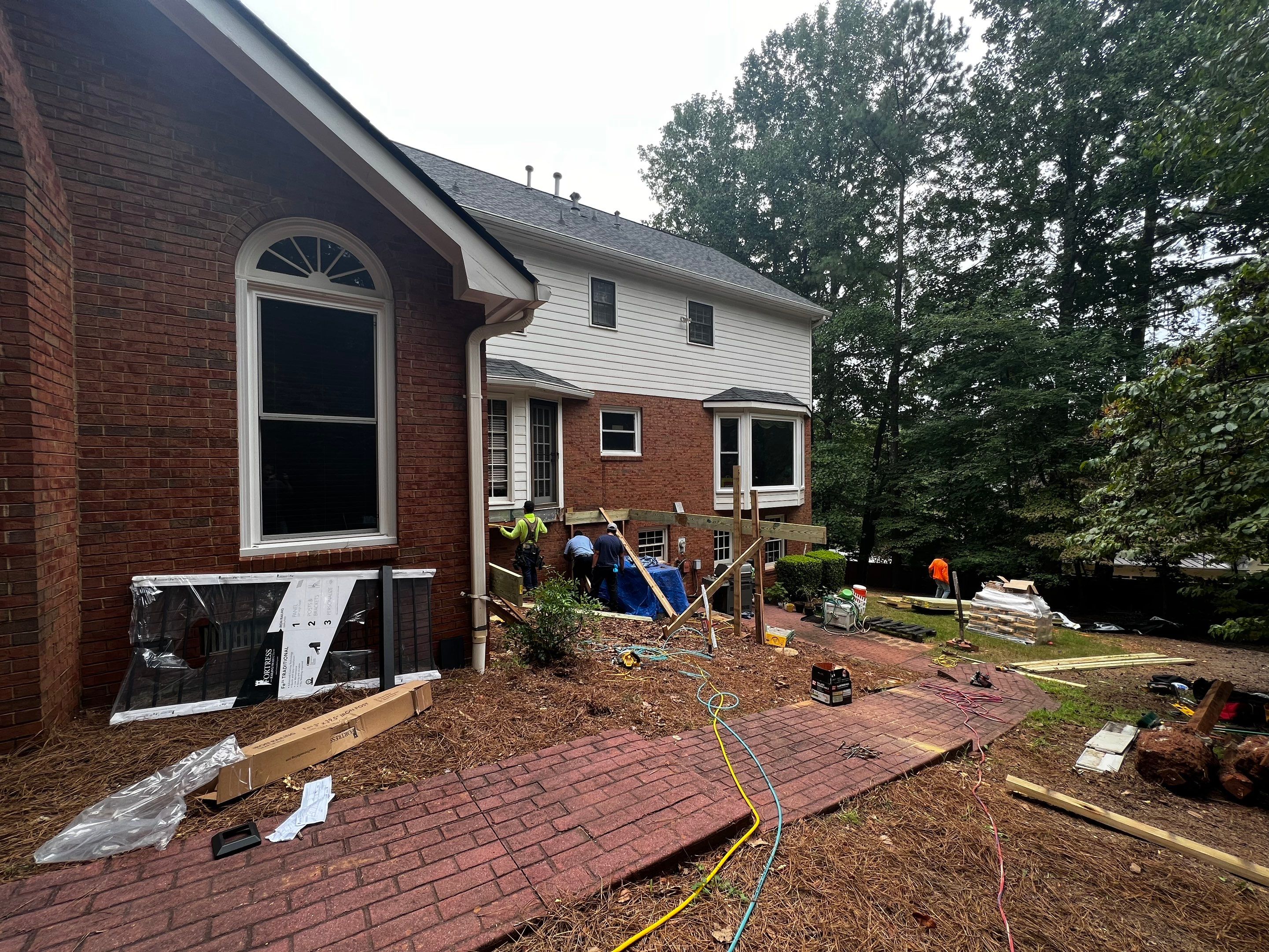 Elevated Composite Deck Installation with Metal Railings in Atlanta by Swift Home Renovations