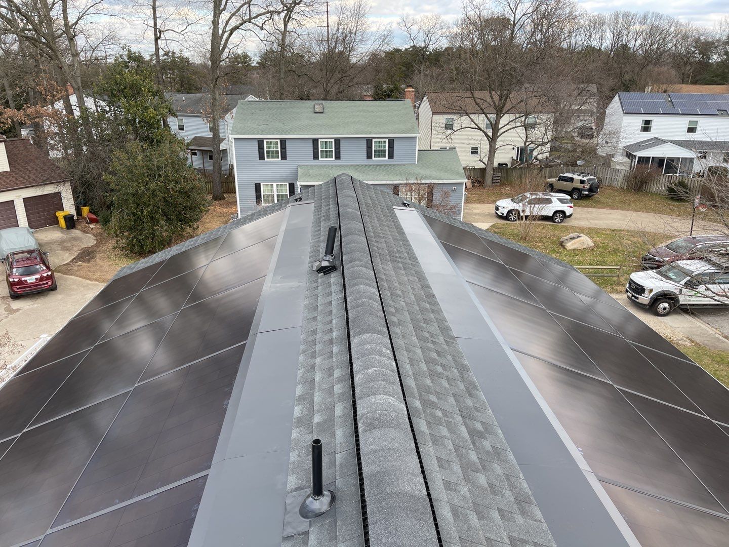 Roof Replacement with GAF Decotech integrated solar panels by American Home Contractors