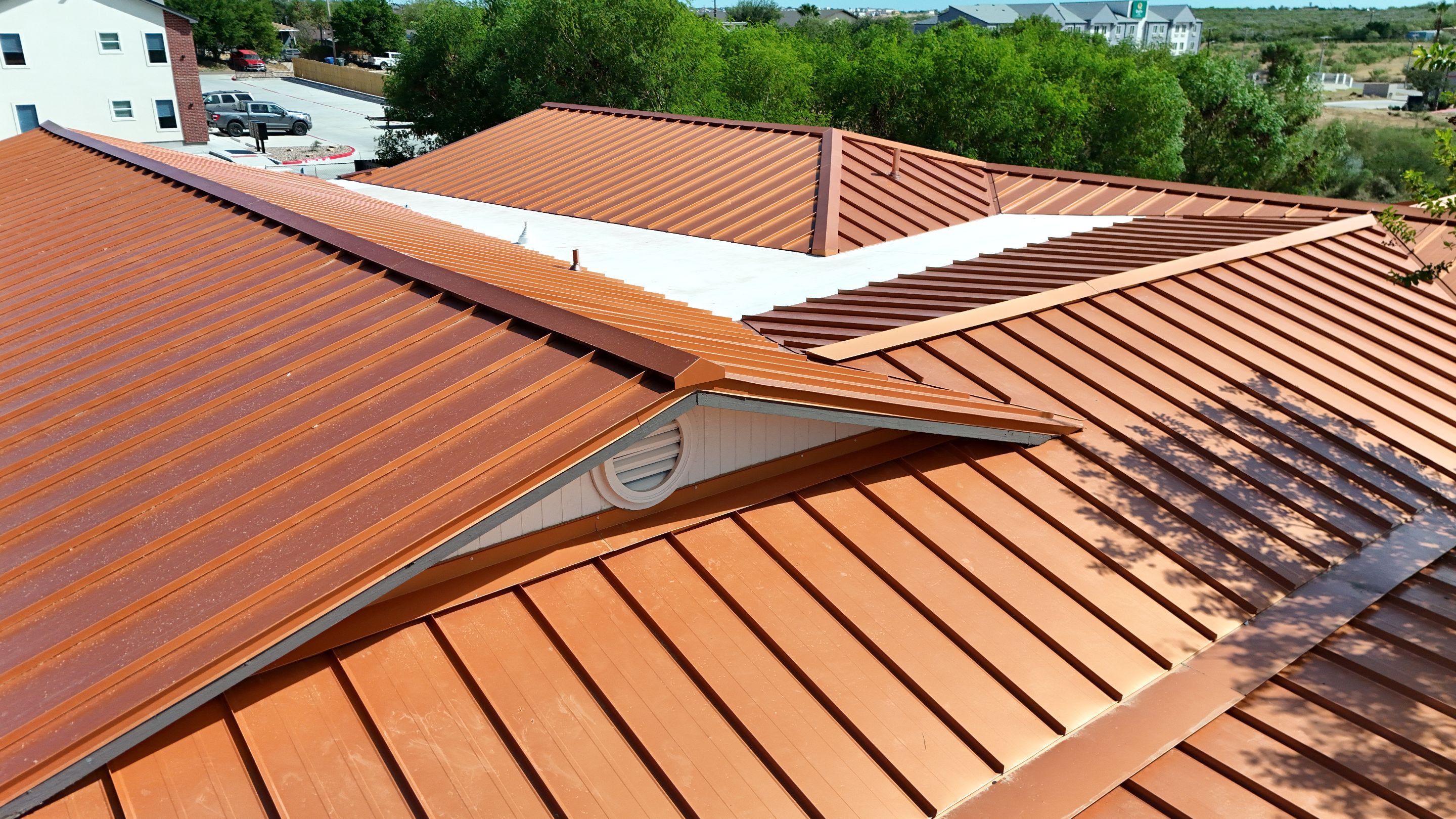 Copper Standing Seam Metal Roof Installation for Laredo Medical Clinic by JM Flores Roofing & Construction, Inc