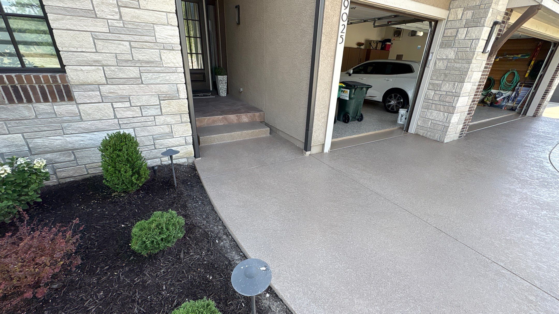 Two-Tone Driveway Resurface - Olathe, KS by Big Red Decorative Concrete, LLC