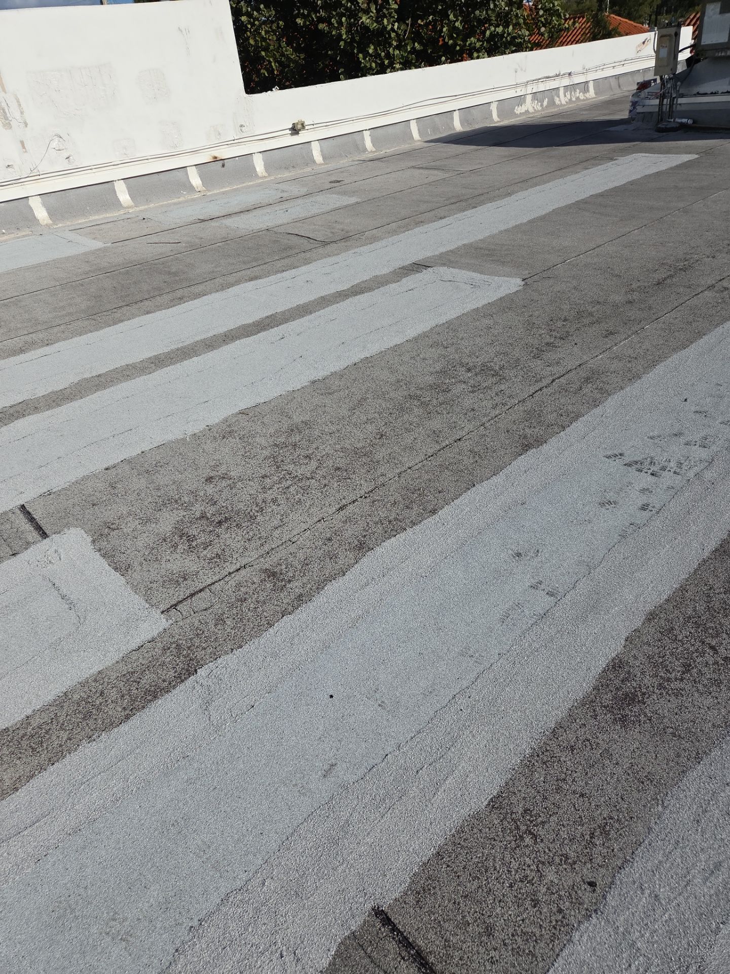 Commercial Flat Roof Restoration Using Silicone Coating in Hallandale Beach by Aastro Roofing