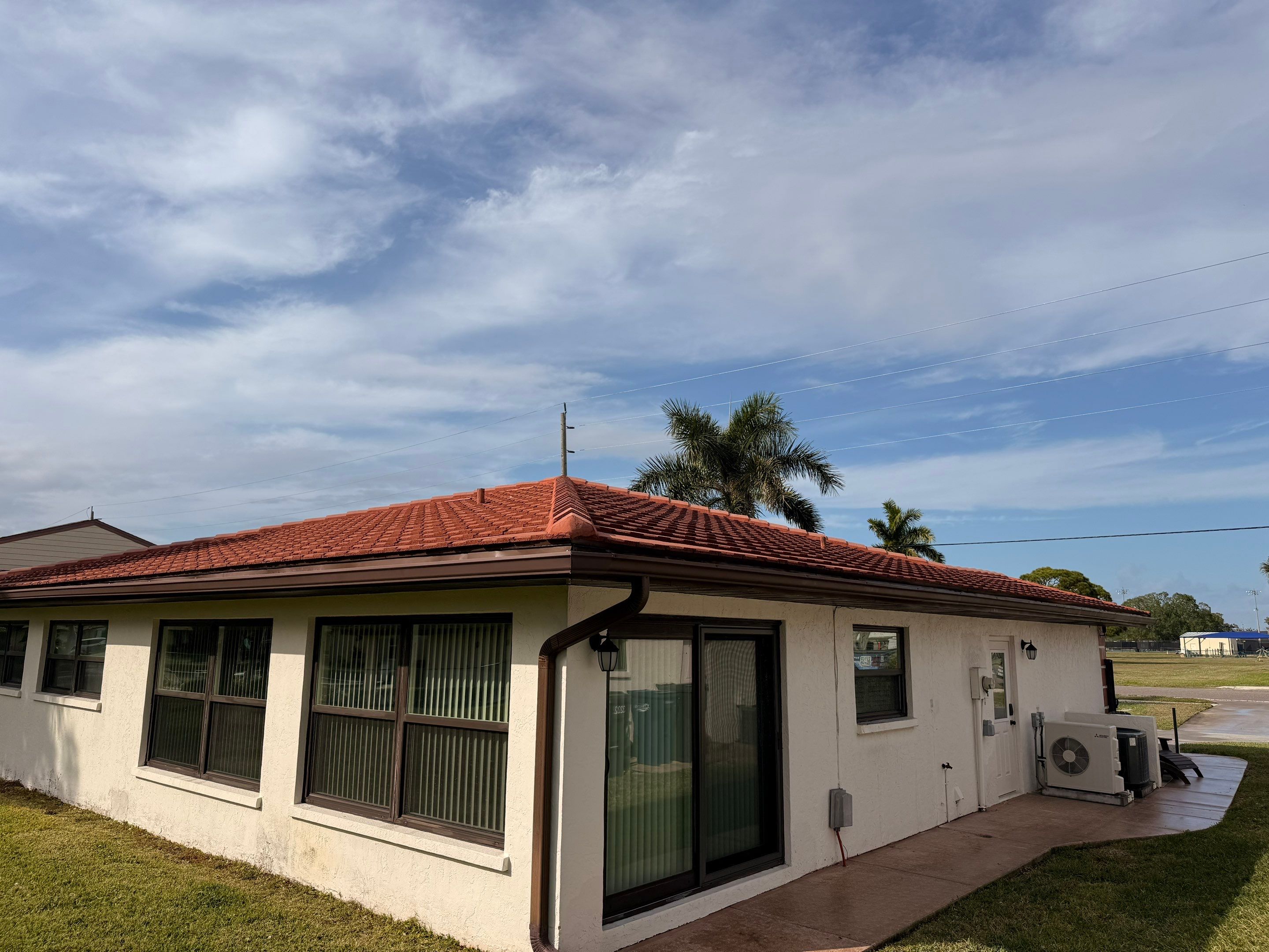 Neighboring Tile Roof Cleanings in Vivienda at Bradenton I – Bradenton, FL by Sunshine AquaWash