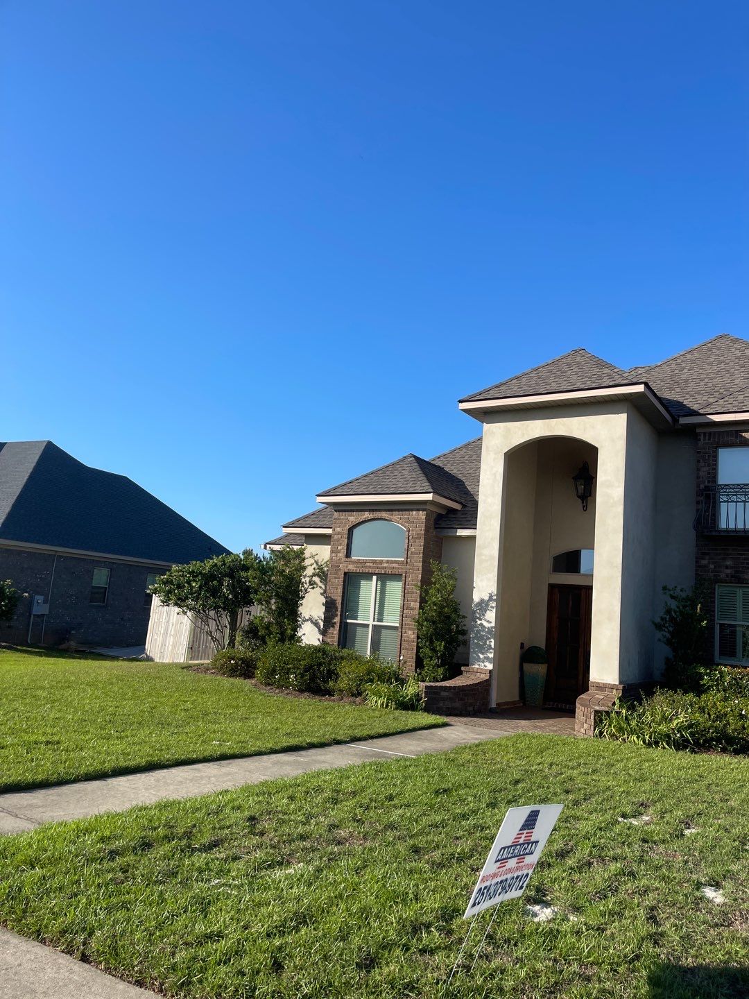 Residential Roofing Installation using Roof Replacement by American Roofing & Construction LLC