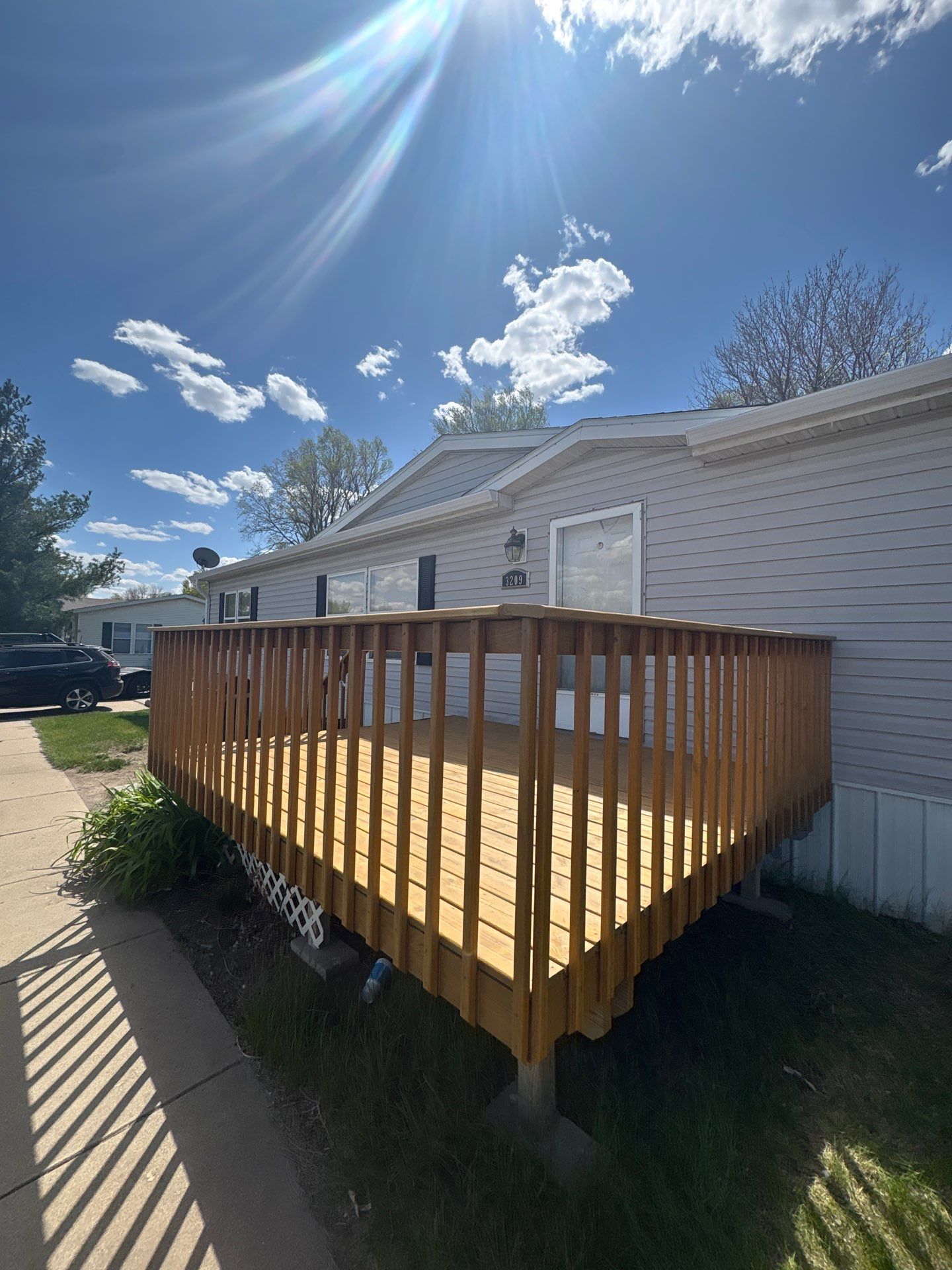 Wood Deck Staining and Interior Paint Refresh in Sioux Falls by Select Painting, Coatings & Garage Cabinets