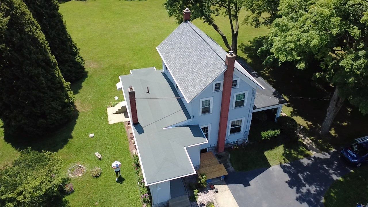 Complete Residential Shingle and Membrane Roof Installation in Salem by Eagle Eye Roofing