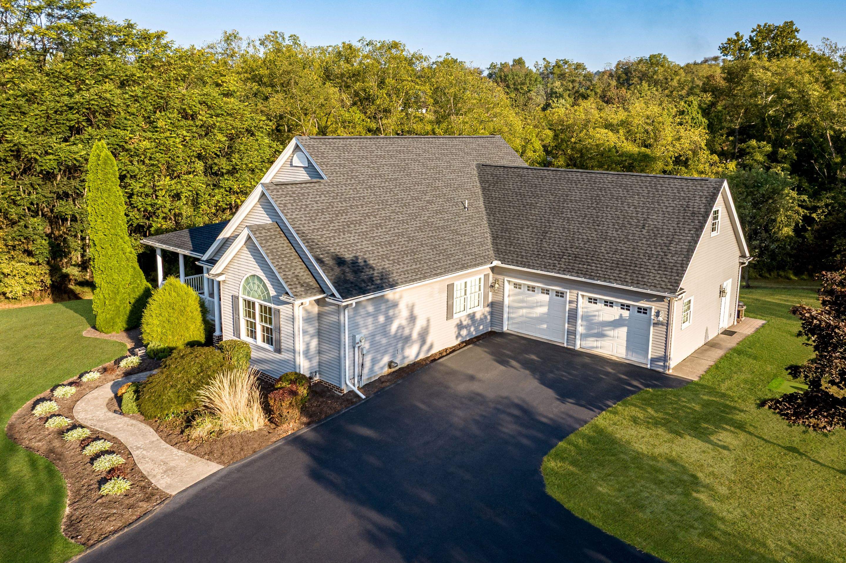 Full Vinyl Siding Replacement and Shingle Roof Install in Millersburg by Esh Builders