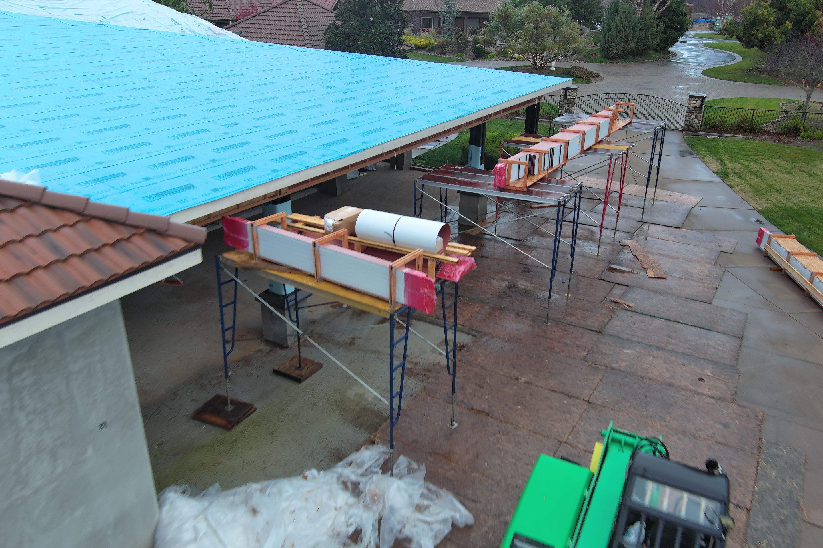 Tile, Metal, and TPO roofing project (new construction) by Straight Edge Roofing Inc