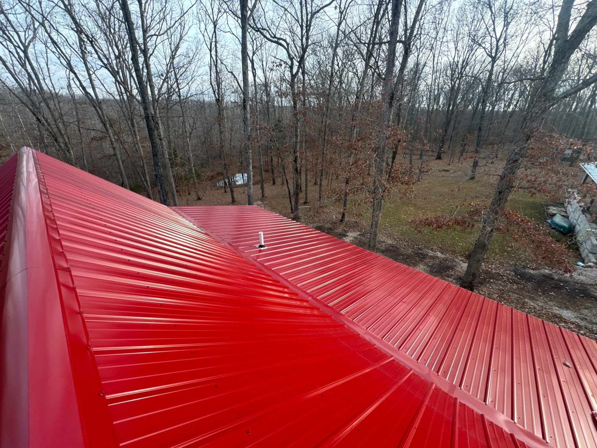 Residential Roofing Install - 29 Gauge G-Rib Metal - Color Dark Red  by Titan Commercial & Residential Roofing 
