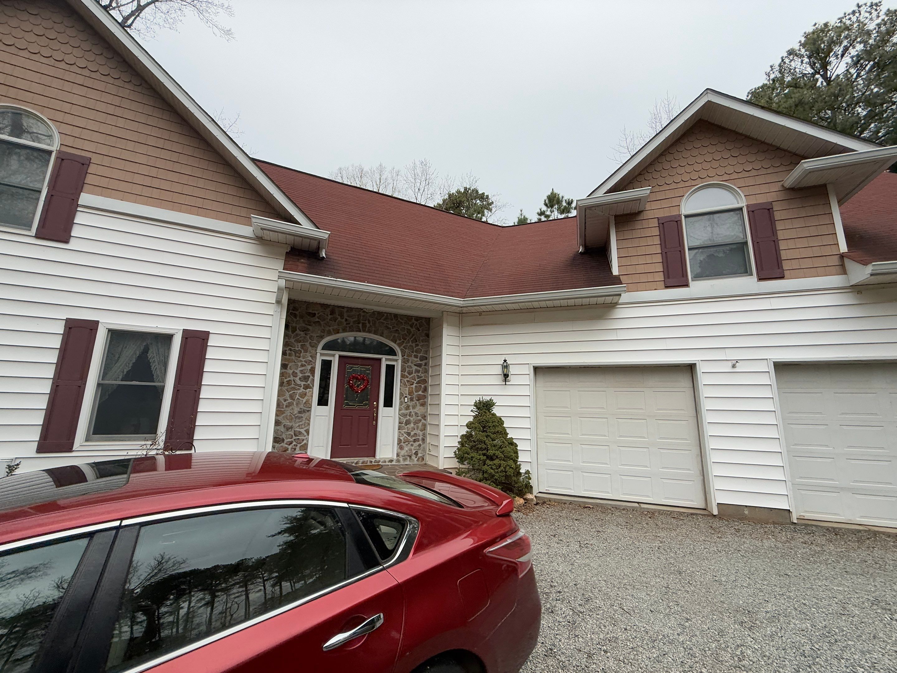 Residential Roofing Installation using  TAMKO Titan XT Rustic Redwood by RISE Roofing & Restoration, LLC