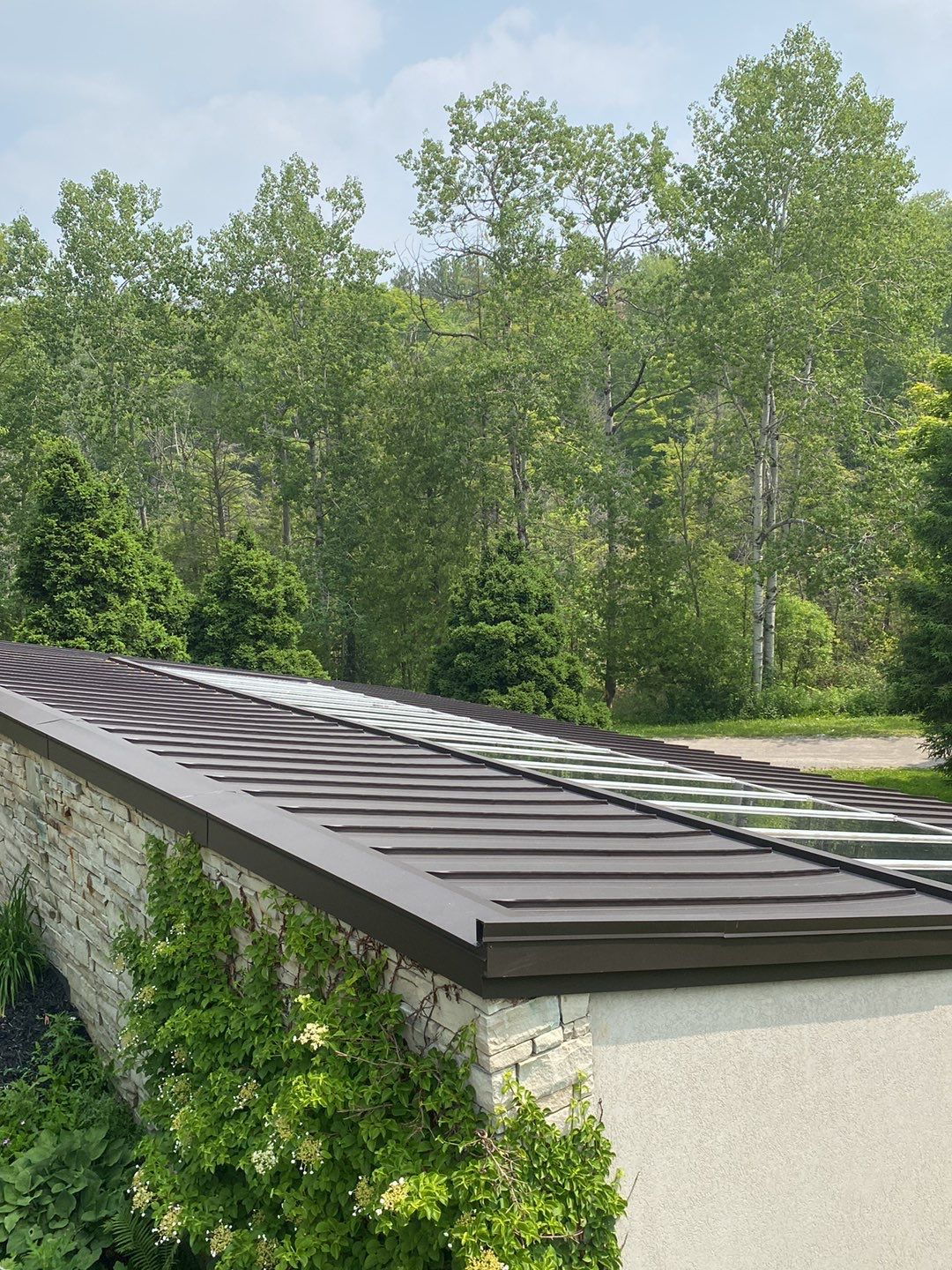 Roof Replacement using 16" Standing Seam Panels by Jay Carter Roofing & Sheet Metal