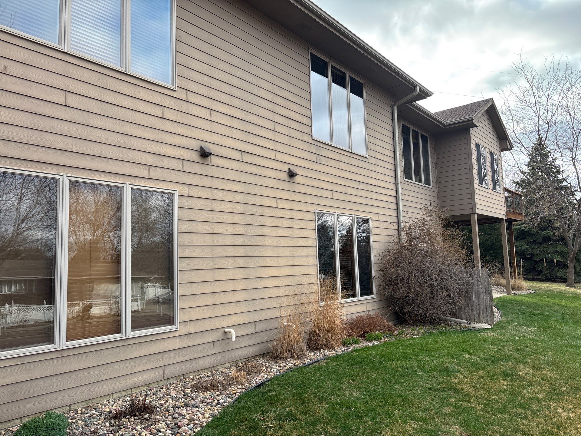 Multi-Story Residential Exterior Painting and Siding Refresh in Sioux Falls by Select Painting, Coatings & Garage Cabinets