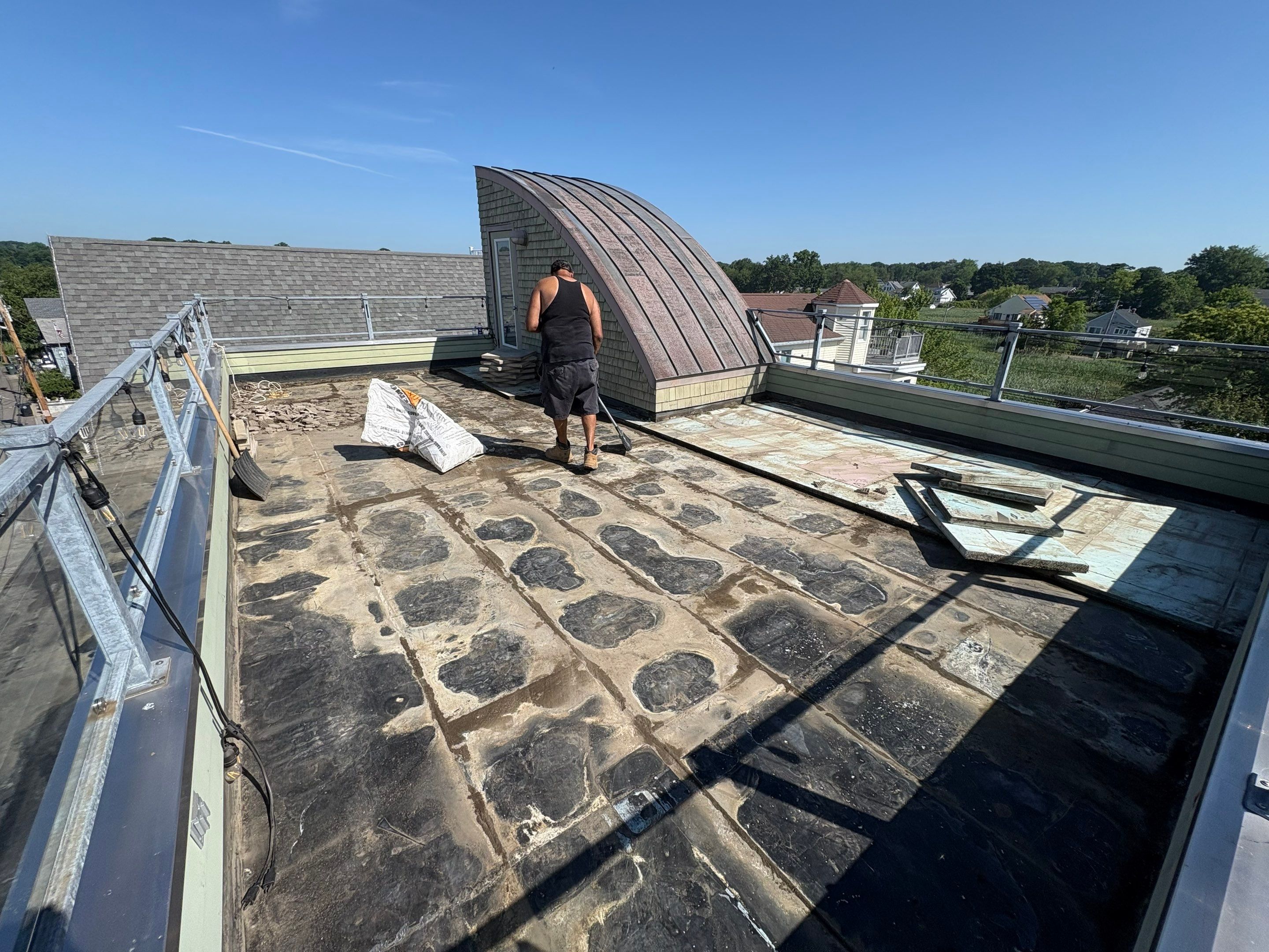 Deck Installation using Tanzite Stone Decking by A Plus Exterior