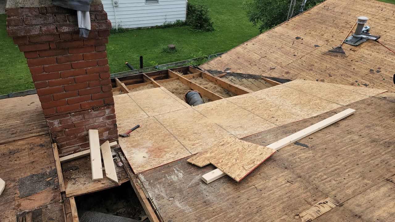 Residential Roofing Installation using 60 mil rubber roof  by Nitro Roofing and Construction