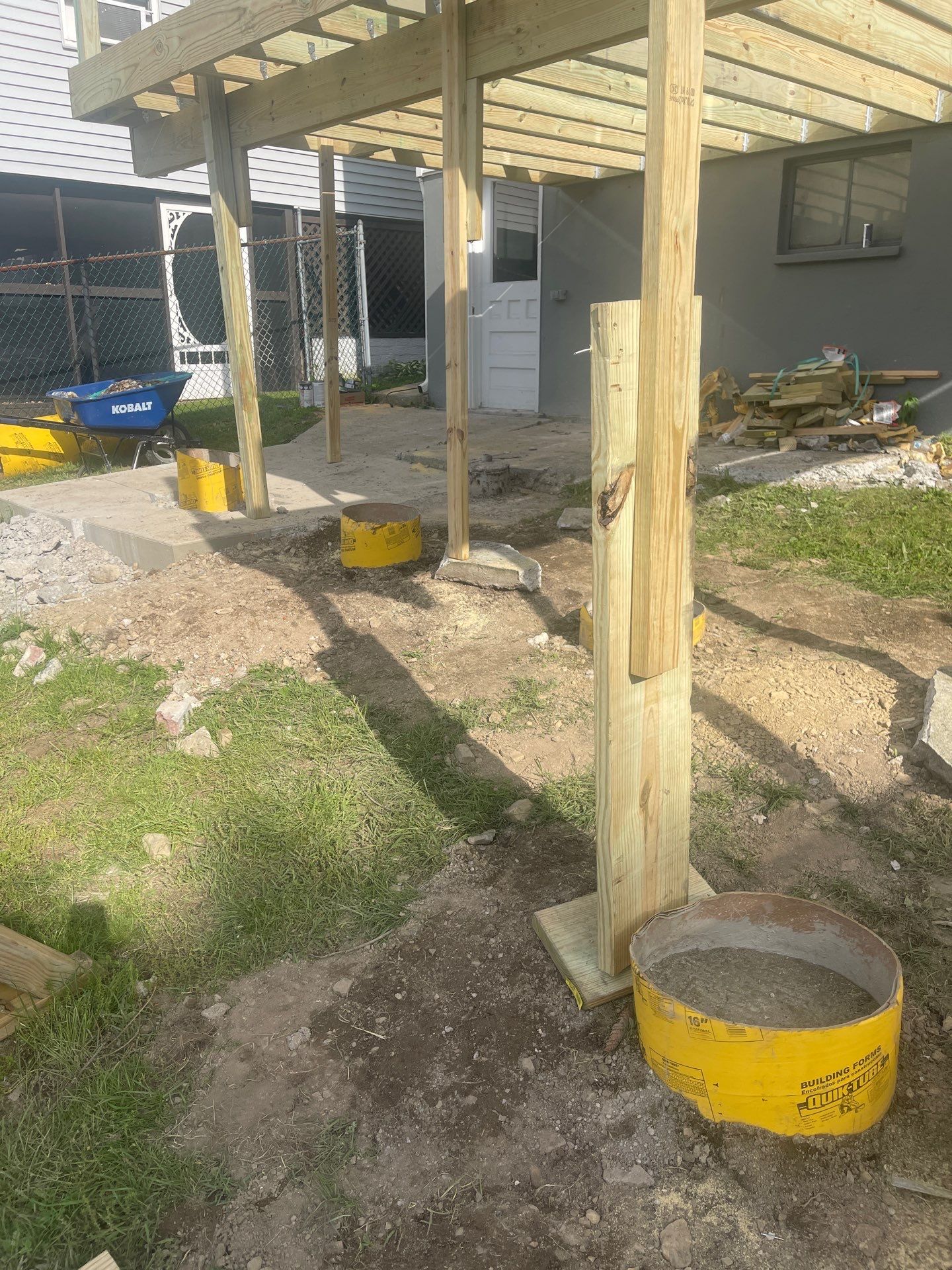 Pressure-Treated Wooden Staircase and Concrete Footing Installation in Schuylkill Haven by Herts Roofing & Construction