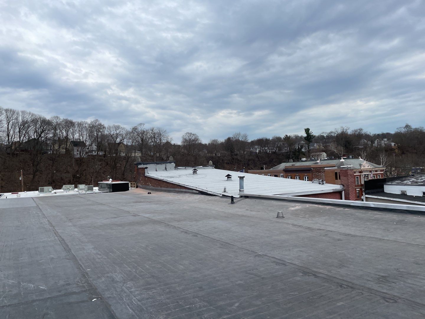 Commercial Roofing Installation using EPDM  by A Plus Exterior