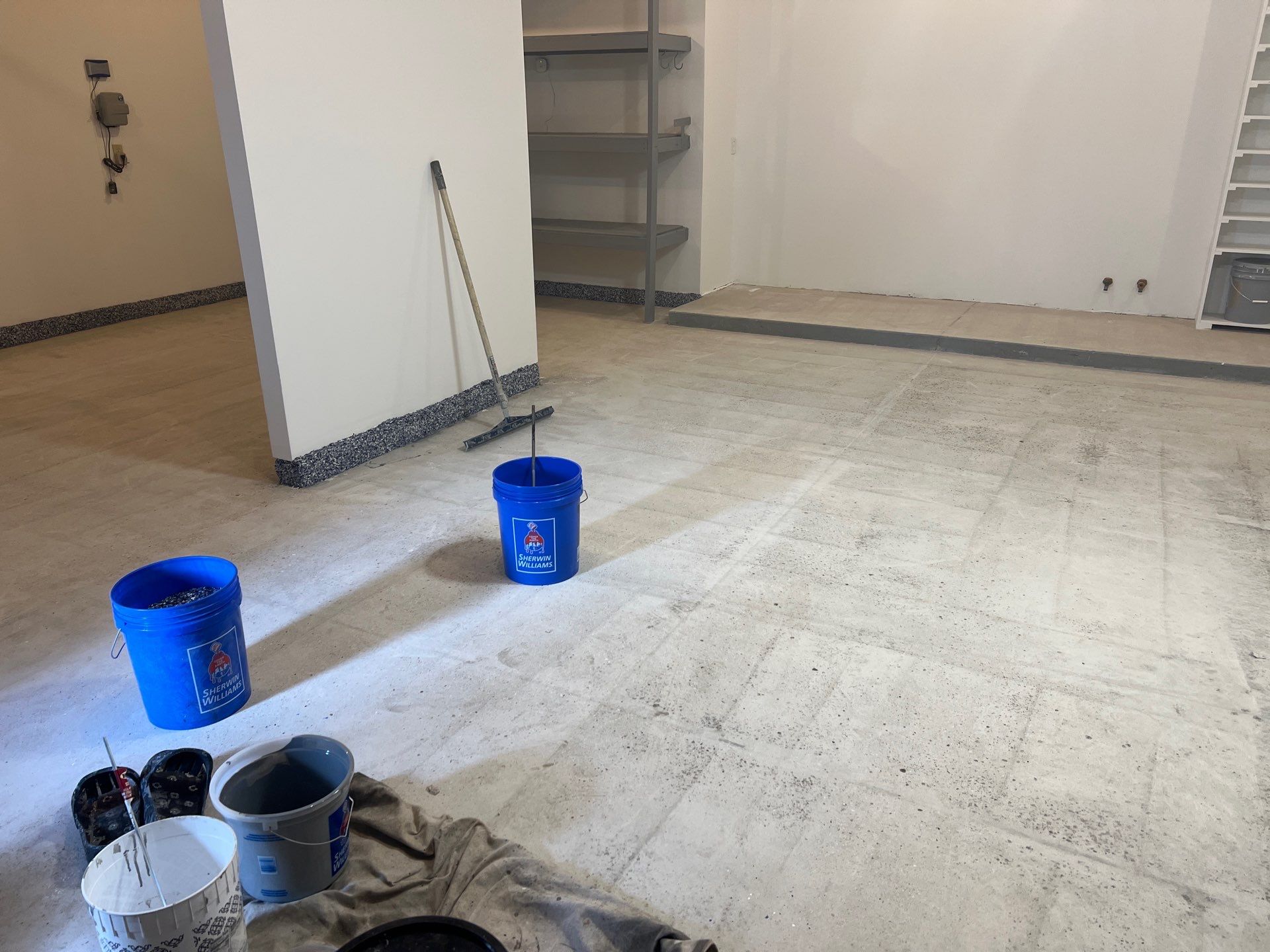 Custom Epoxy Flake Floor and Garage Wall Renovation in Ada by Gordon Painting