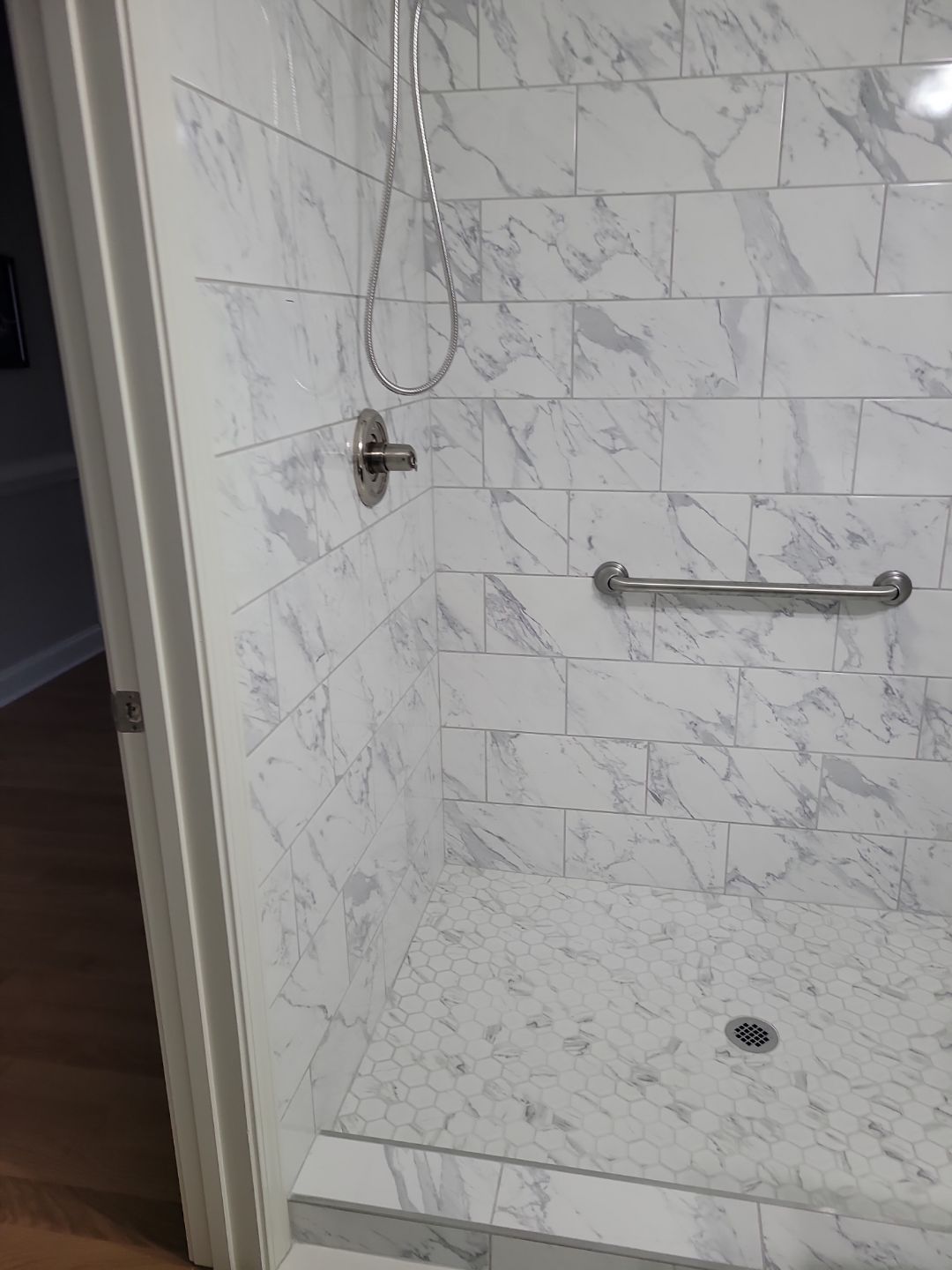 A Pathway to Possibility – Turning a Half Bath into a Full Retreat in Holly Springs by Elite Remodeling and Design LLC