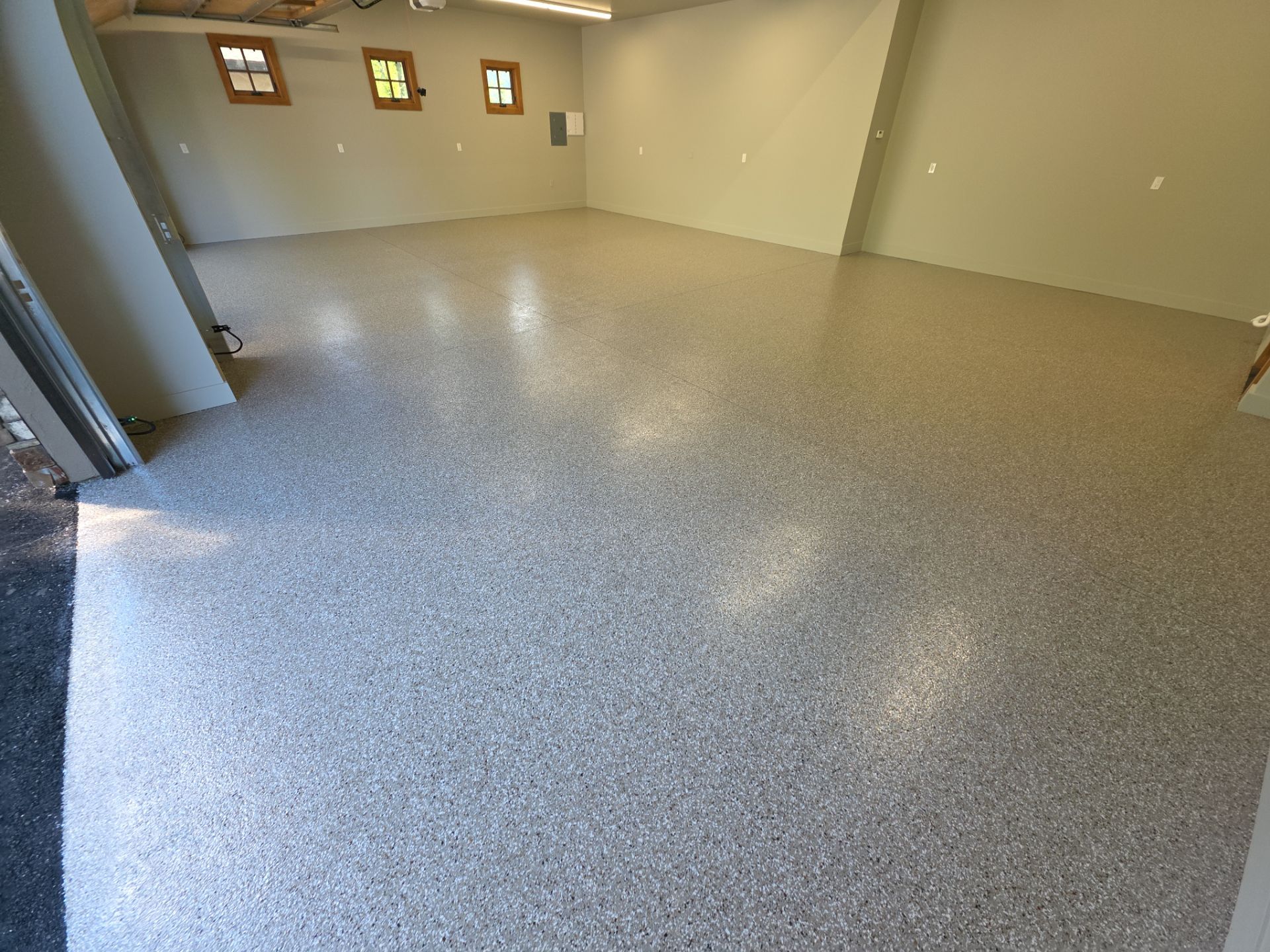 Garage Transformation using Pebble Beach by Croc Coatings, LLC
