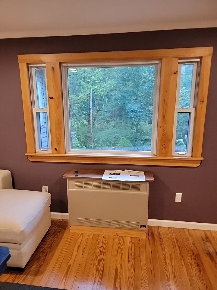 Deck installation using cable railing. by Burke Home Services