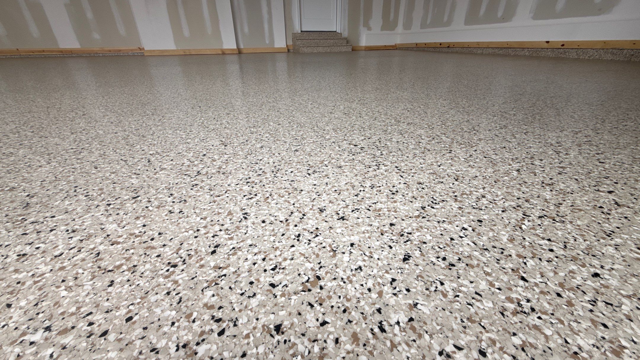 Mark Chose The Best Time To Do His Floor, Right Before Move In  by Banner Garage