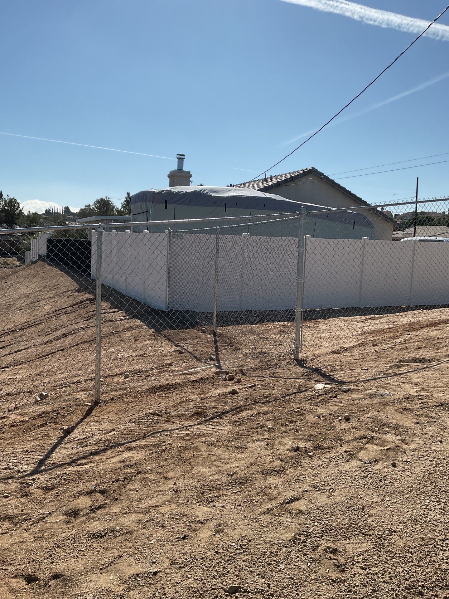 Fence Installation using chain -link by Fence Guys Inc.