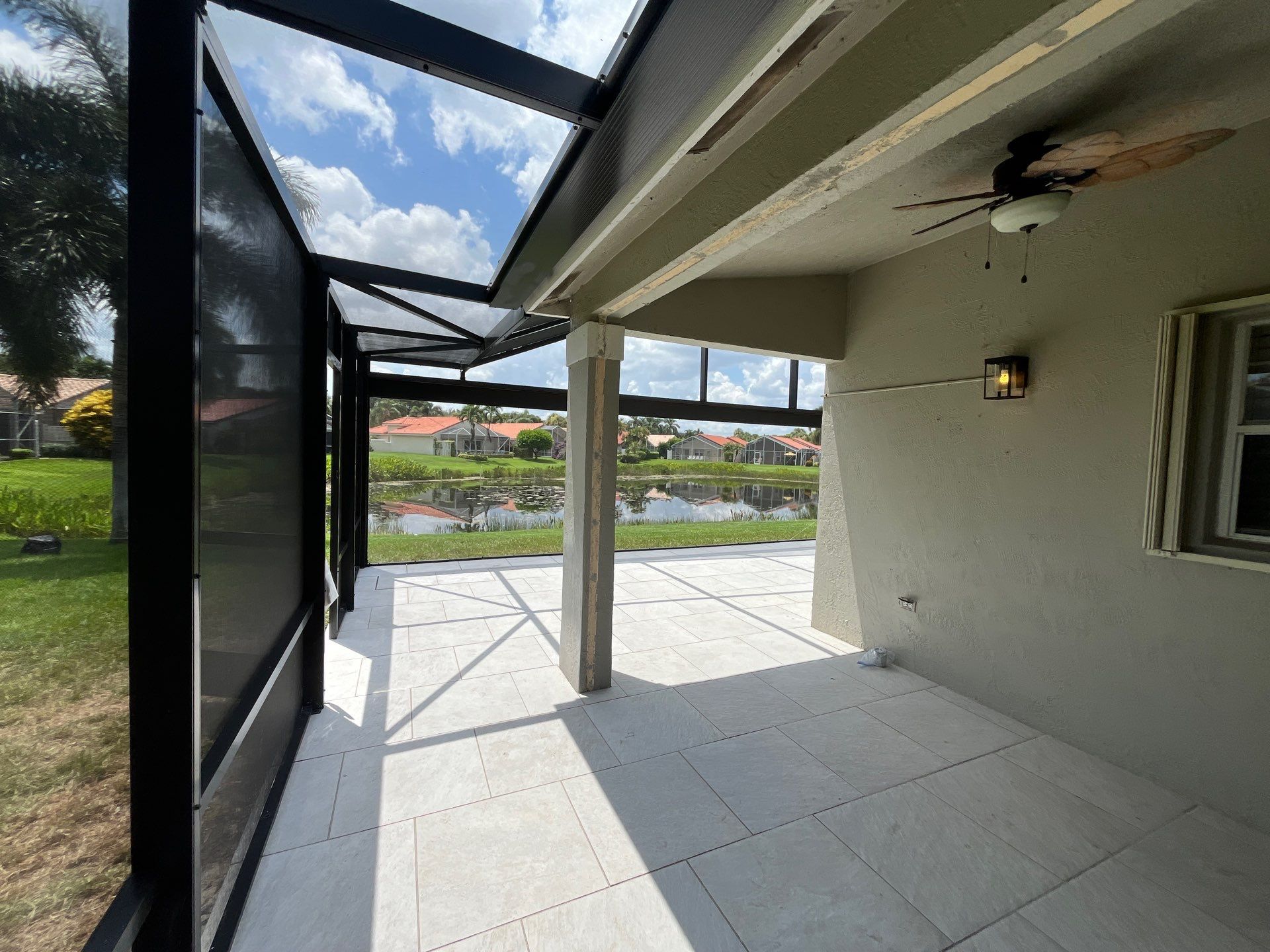 Porcelain Paver Patio and Screen Enclosure Installation in Boynton Beach by The Screen Depot, Inc