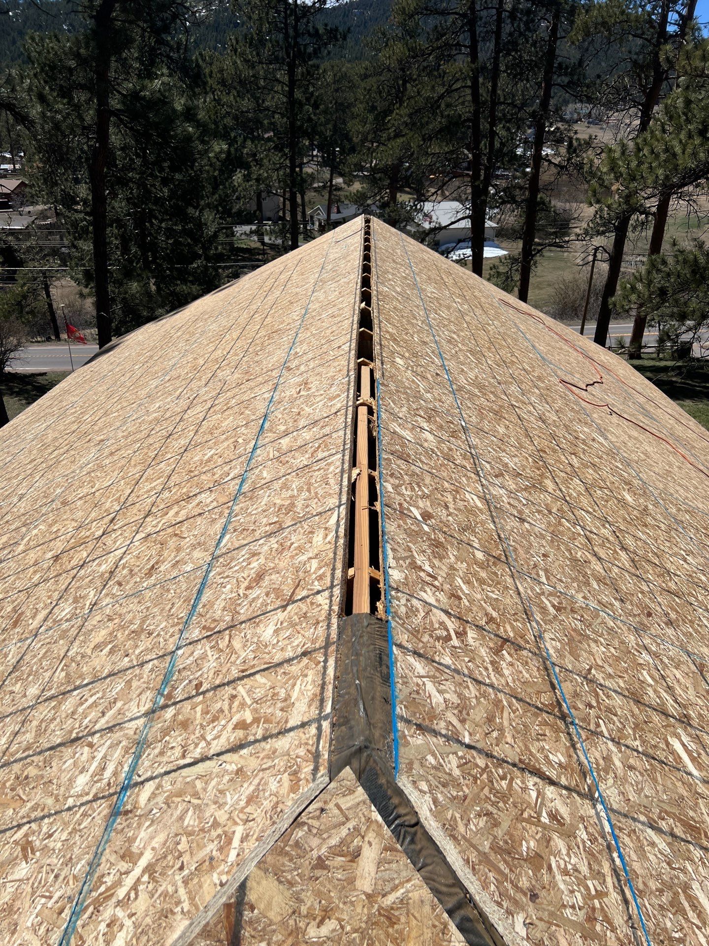 Residential Roofing Installation using Standing Seam Metal by Blue Peaks Roofing LLC 