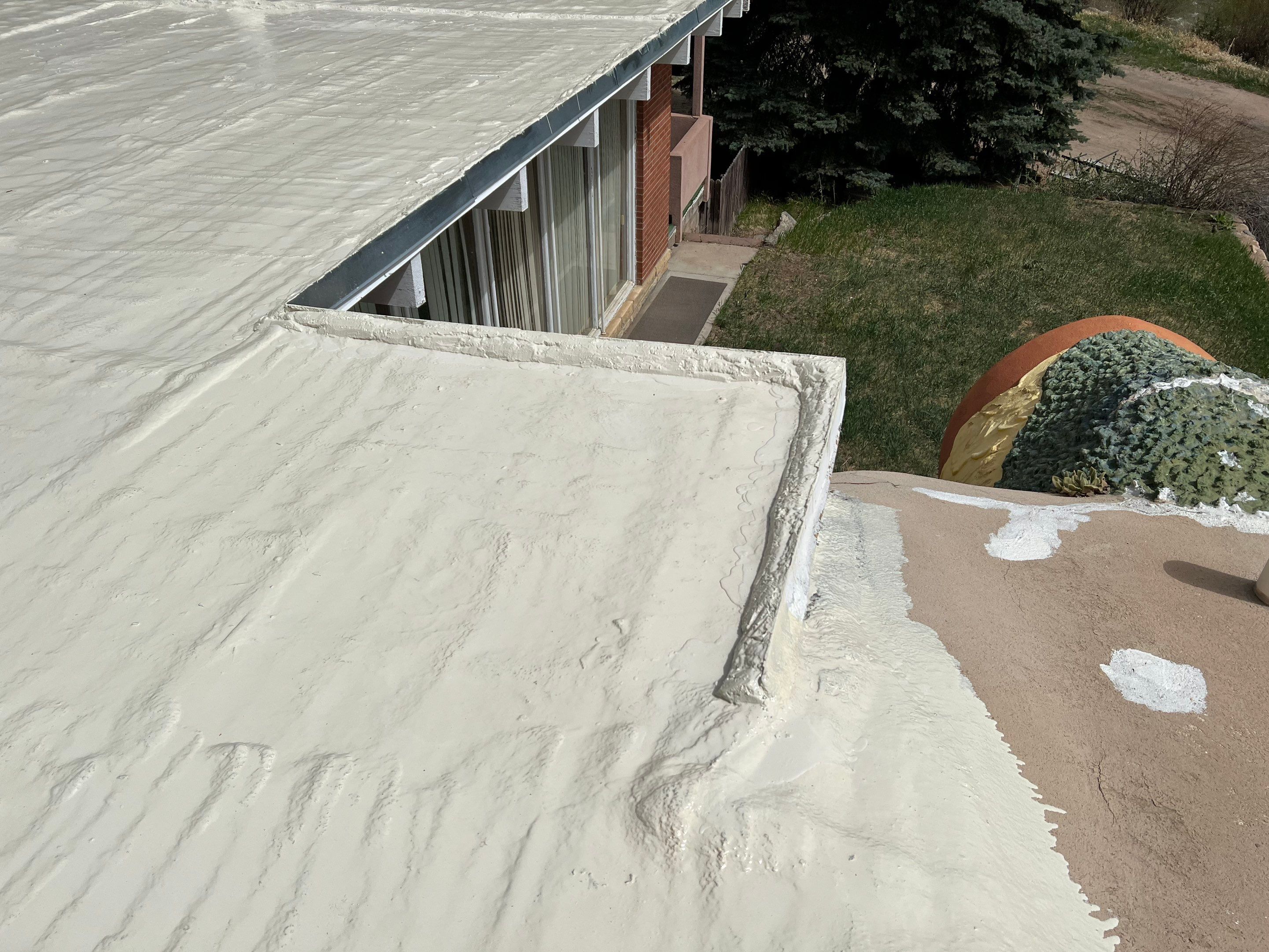 Commercial Roofing Installation using CASTAGRA ECODUR COATING by A to Z Roofing