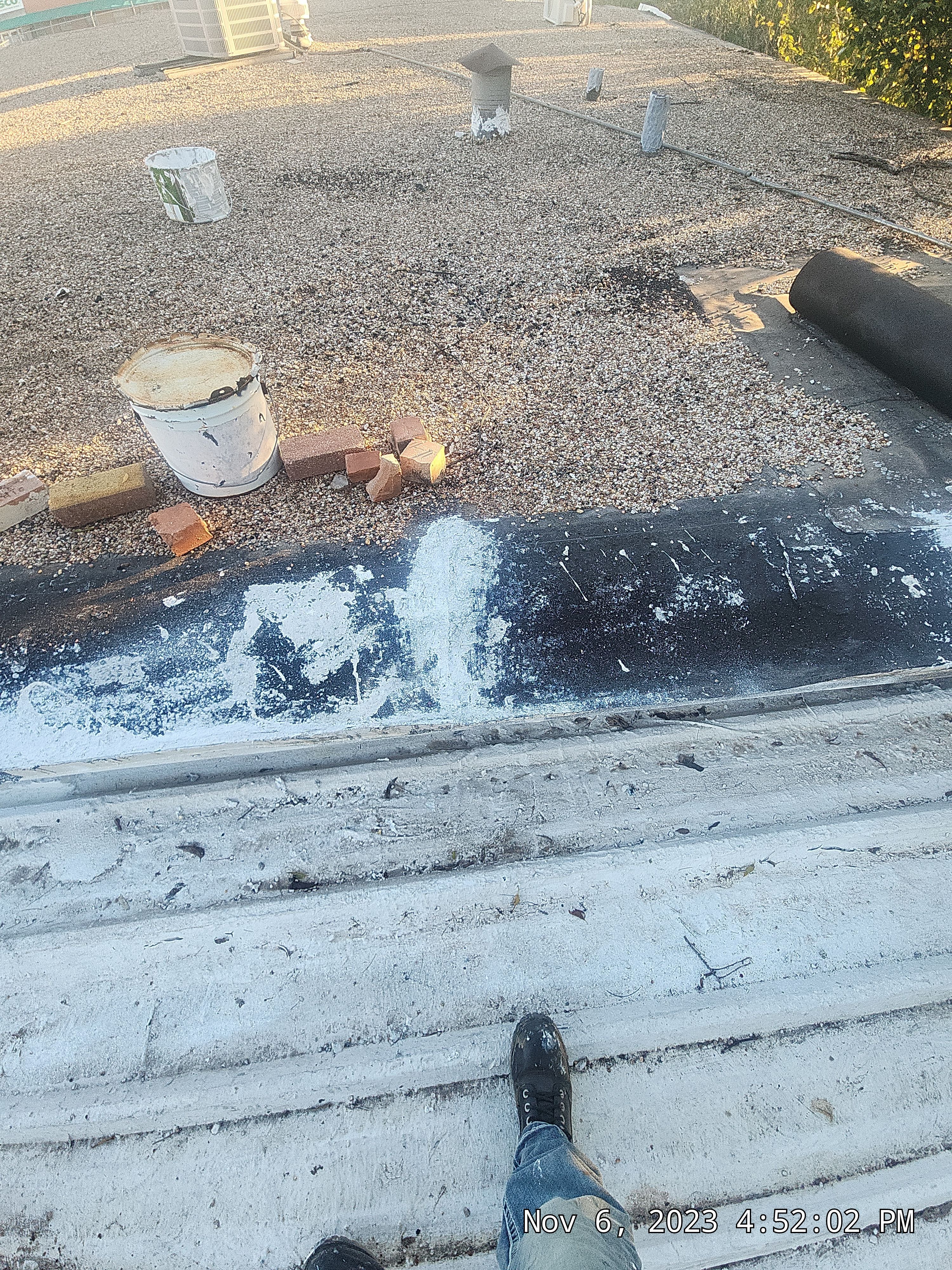 Commercial roofing overlay using GAF TPO over an old ballast roof by Becker Roofing and Exteriors