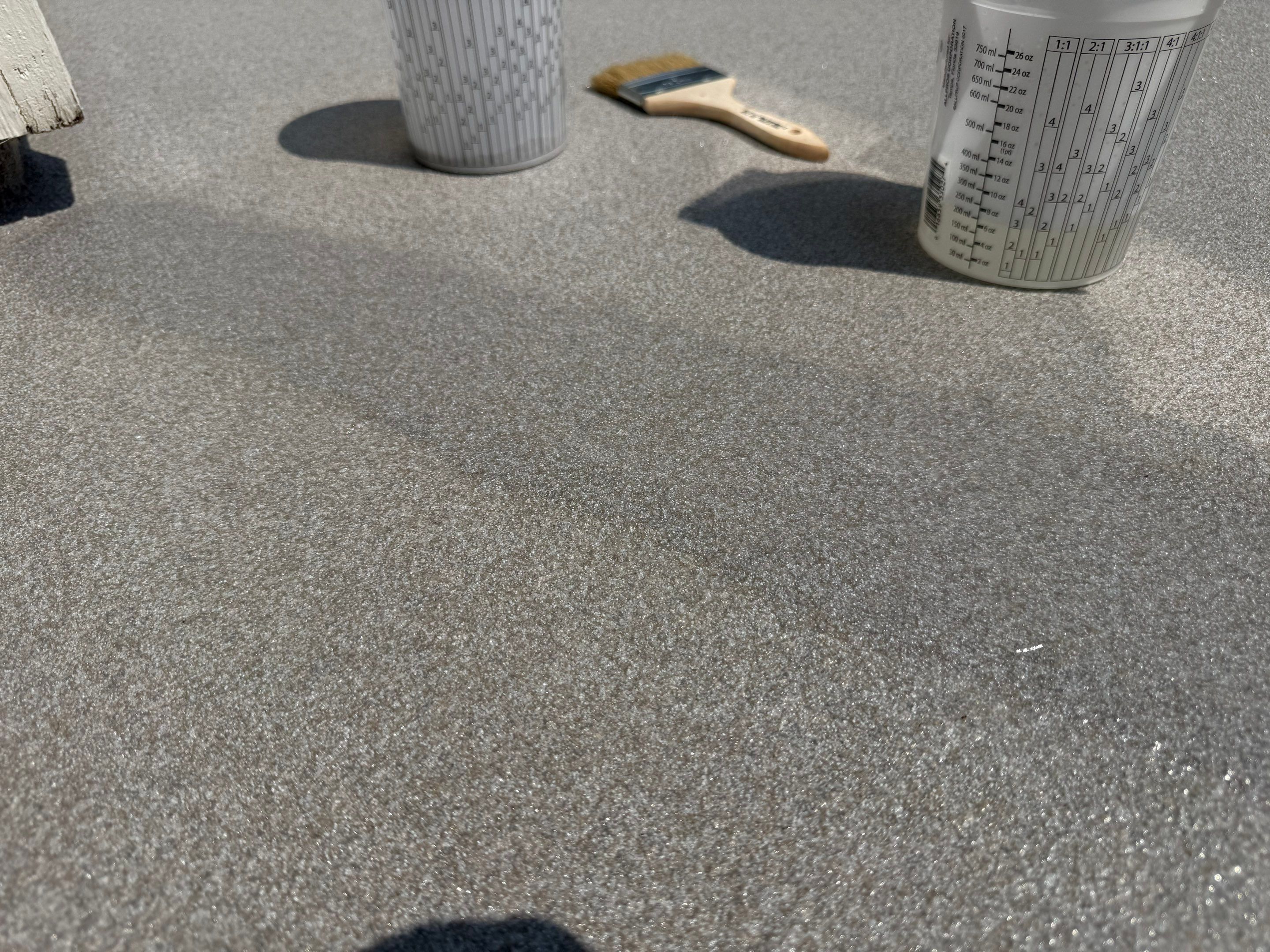 Concrete Patio Coating with Fuzzy Wool Finish in Sioux Falls by Select Painting, Coatings & Garage Cabinets