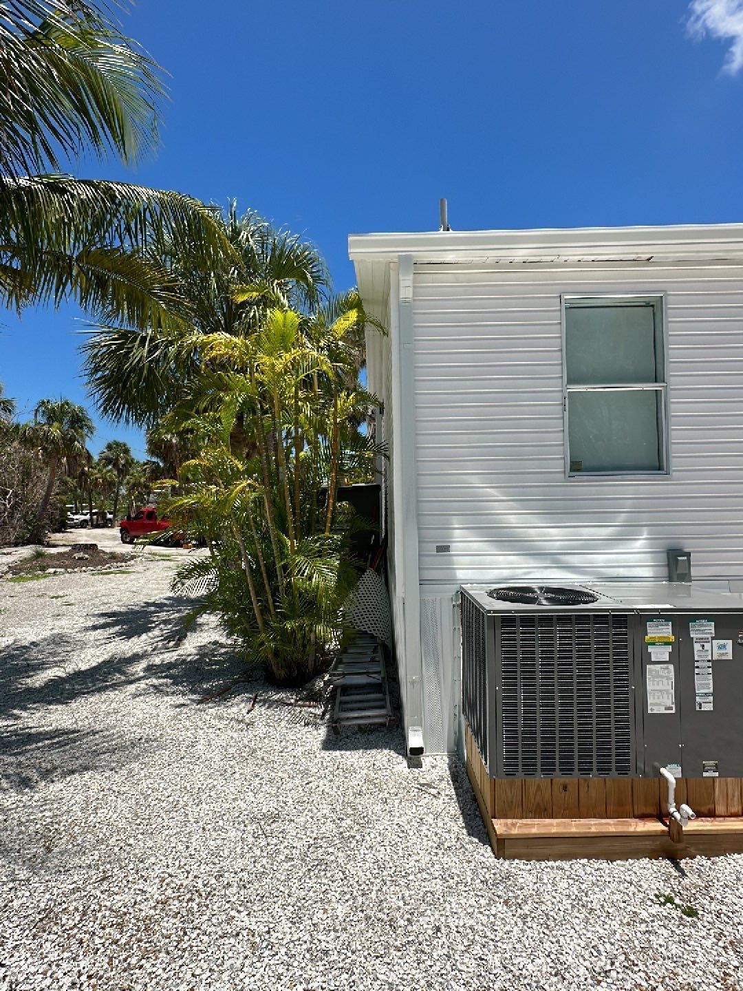 Downspout Installation using Charcoal Grey in Sanibel FL by Gutter Professors