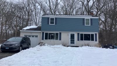 Siding Transformation with Certaplank S/7 insulated Herringbone, and Cert Monogram D/5x12' Dutchlap Wedgewood Blue