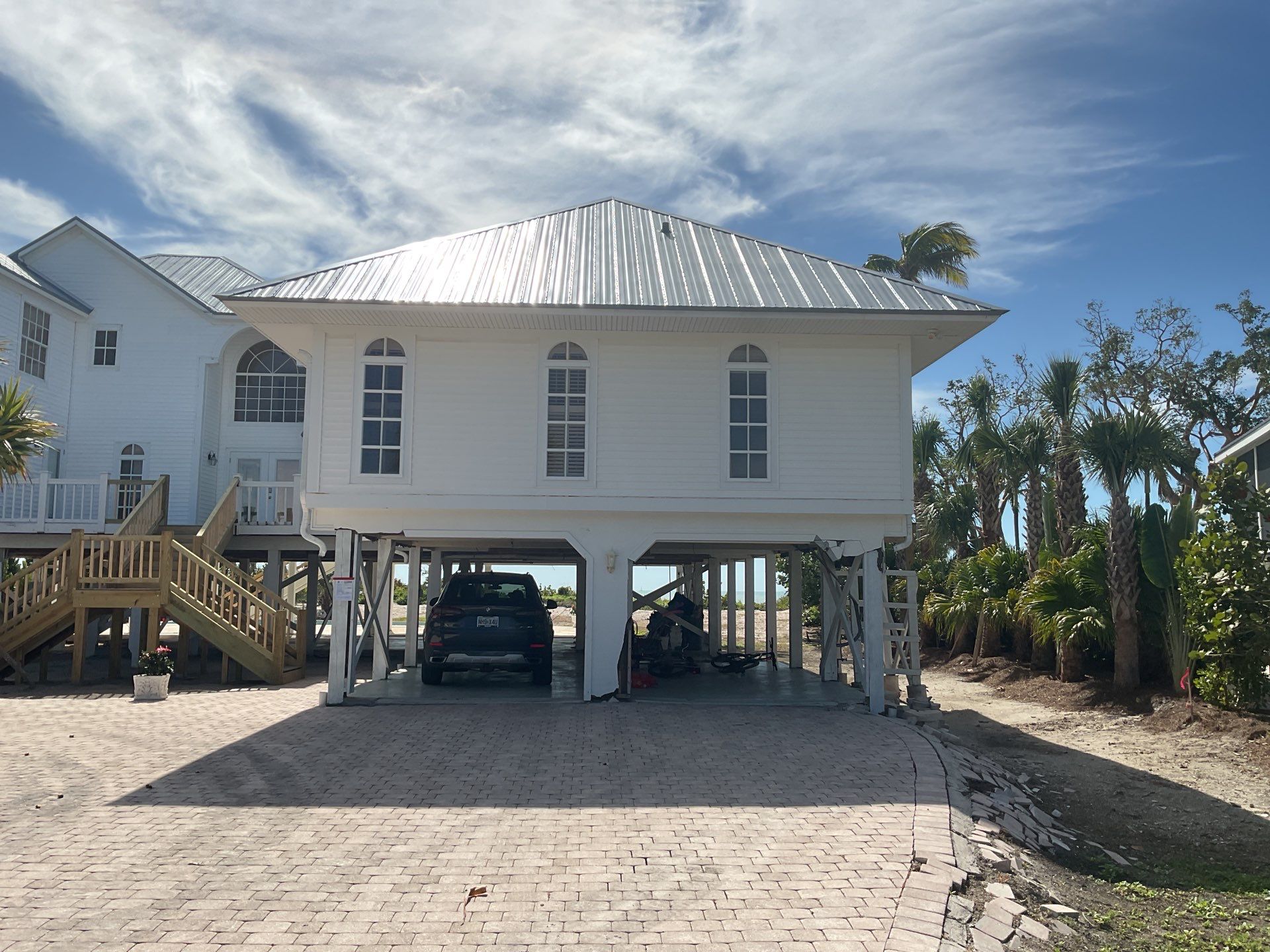 Downspout Installation using Downspout Extension in Sanibel FL by Gutter Professors
