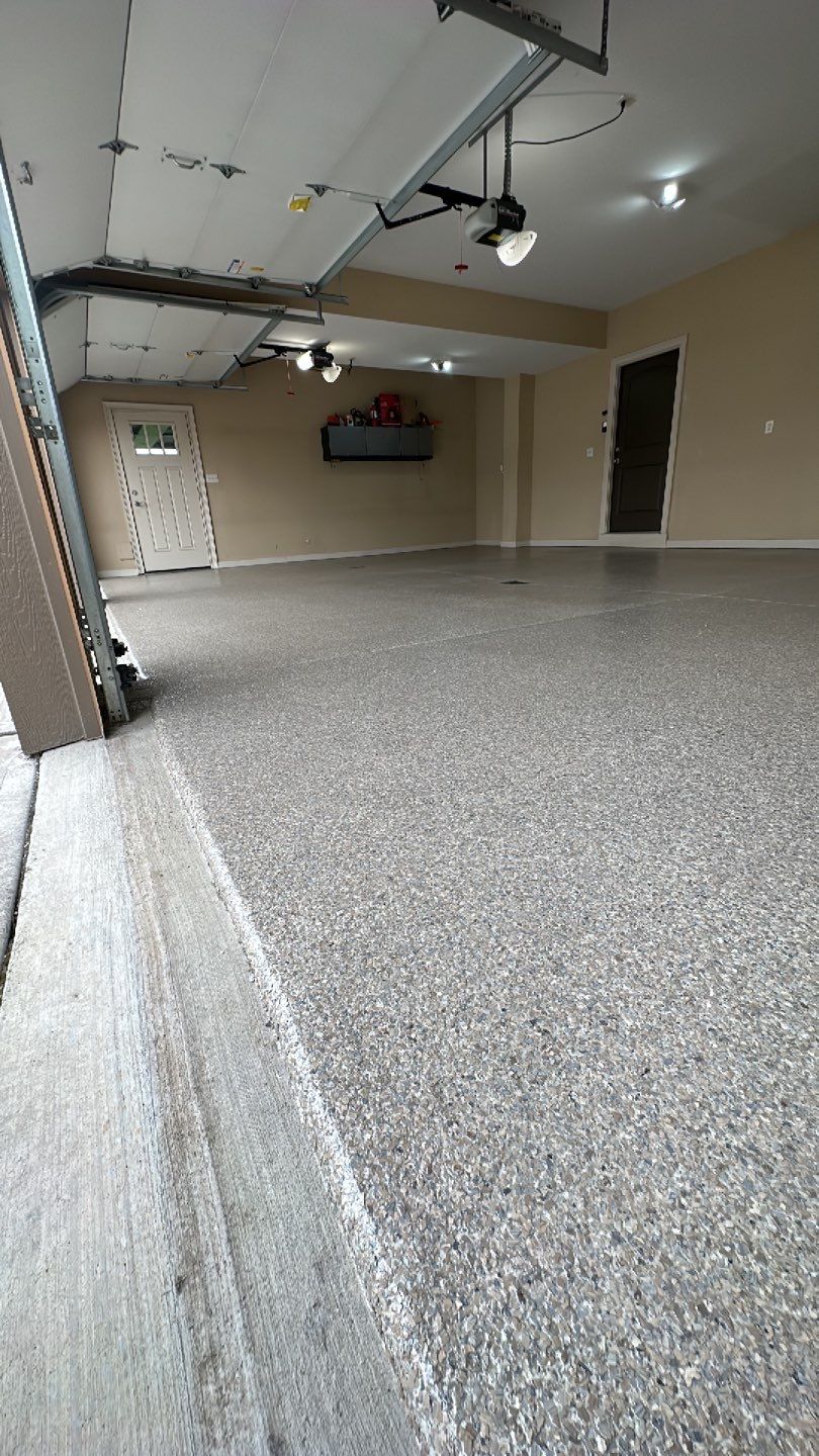 Large Patio + Garage Project in Moon Township by Floors in a Day, Inc