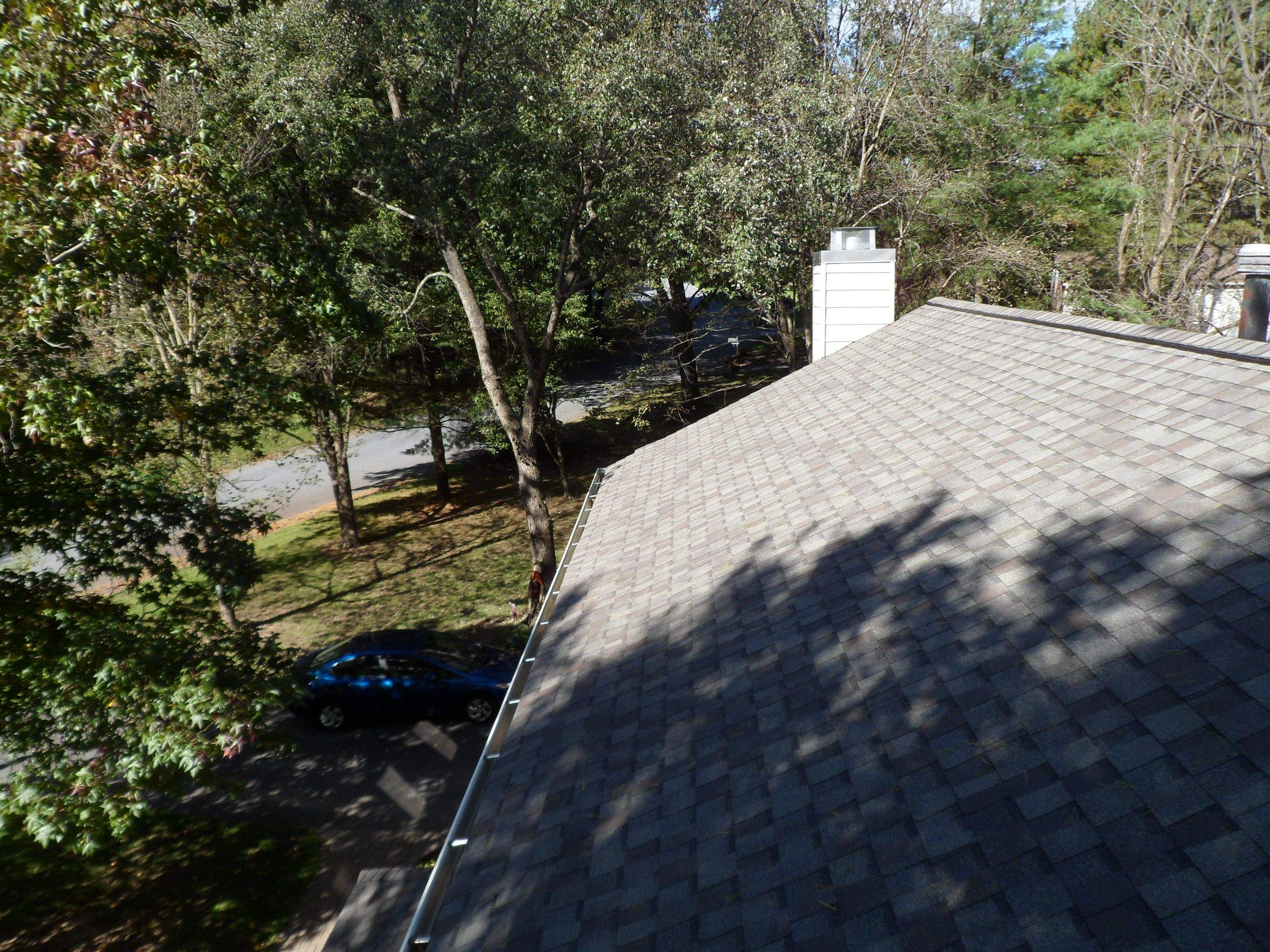 Residential Roofing Installation using Landmark Shingles Color Weatherwood by Alpha Design Services