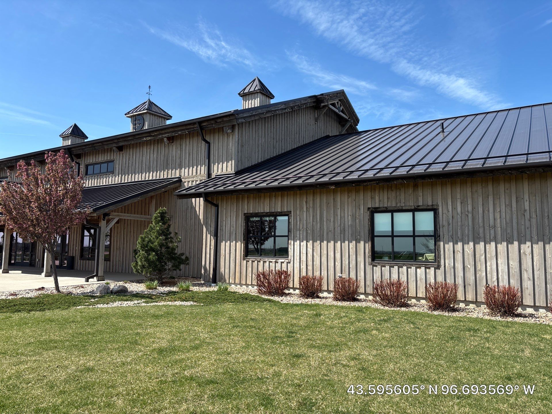 Commercial Exterior Wood Staining for Sanford Barn in Sioux Falls by Select Painting, Coatings & Garage Cabinets