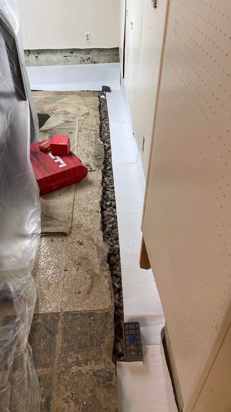 Interior Waterproofing Using GrateDrain™ Products by Toledo Basement Repair 