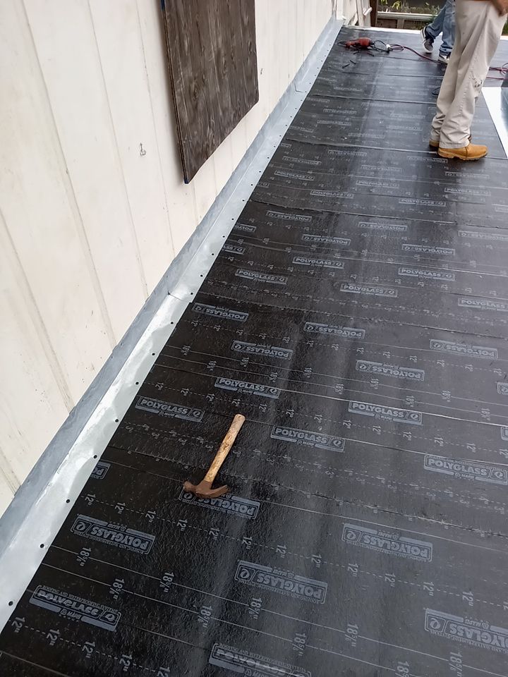 Its to Hot! Insulate this roof by Bayfront Roofing and Construction