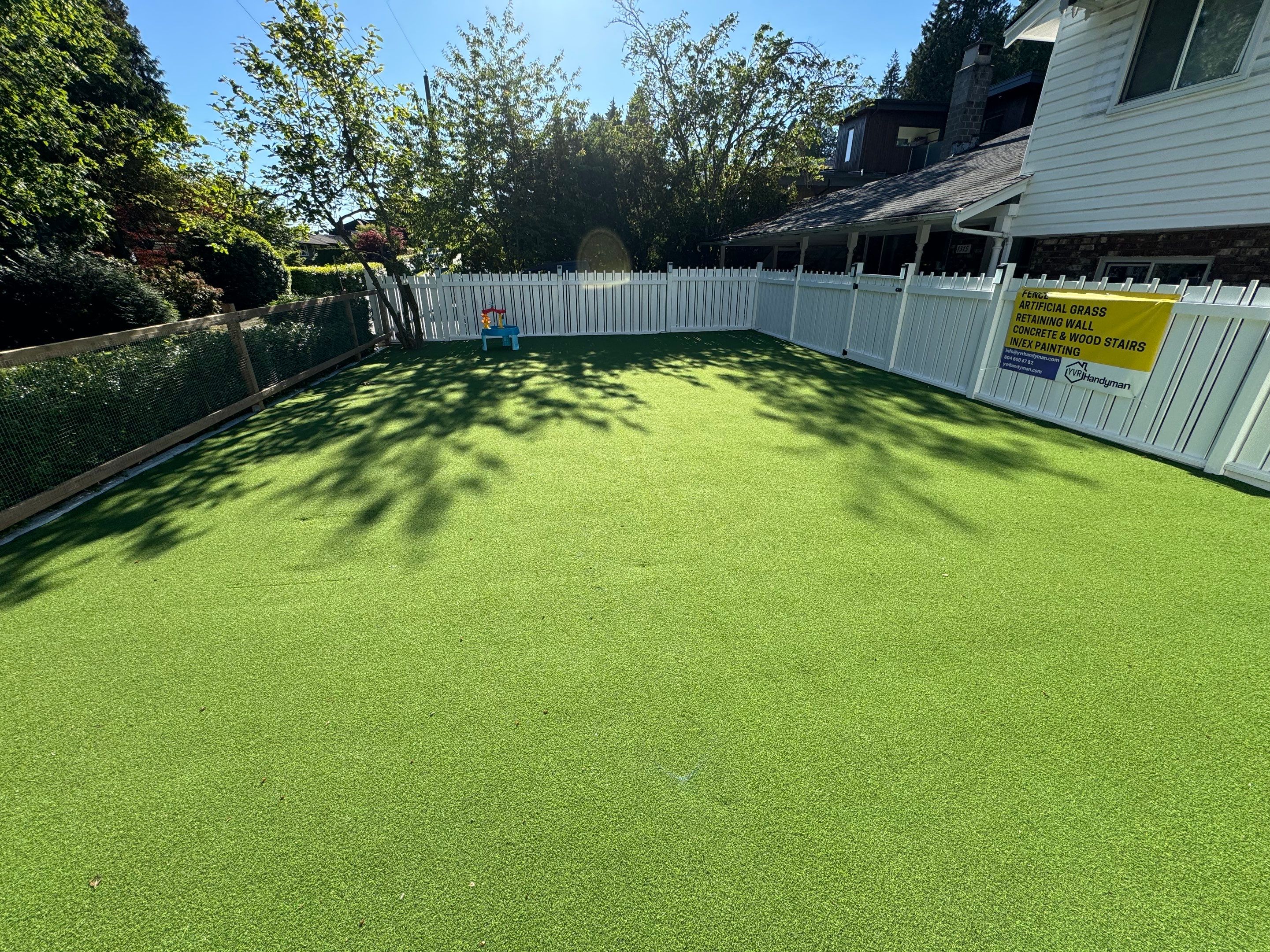 Artificial Grass and Custom Fence For KidiKare Daycare by YVR Construction Group