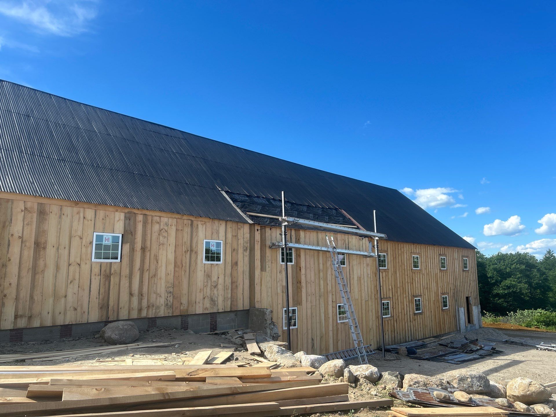 Barn Restoration and Board-and-Batten Siding Installation in Hansons Ridge by B's Roofing & Construction LLC