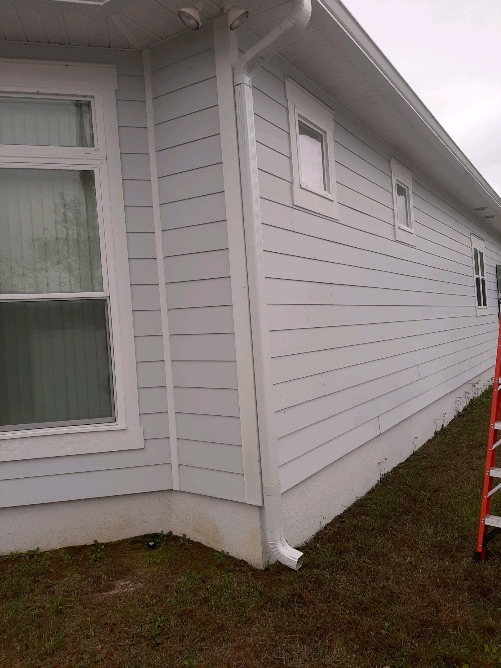 Gutter Installation using White K-Style Seamless Gutters by Gutter Professors