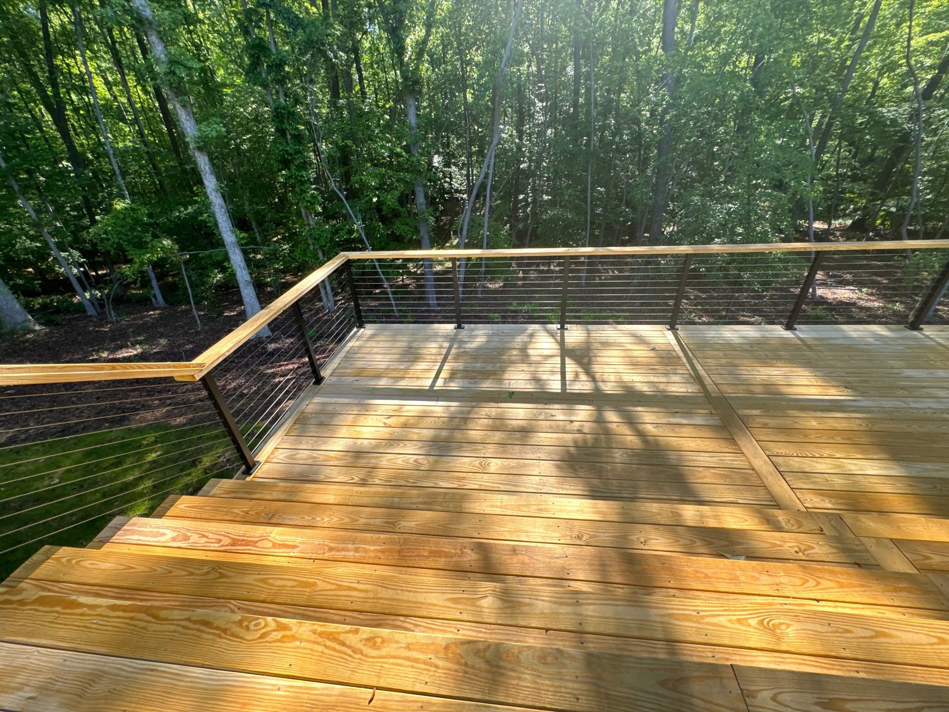 Porch and Deck staining  by GonzalezPainters & Contractors Inc 