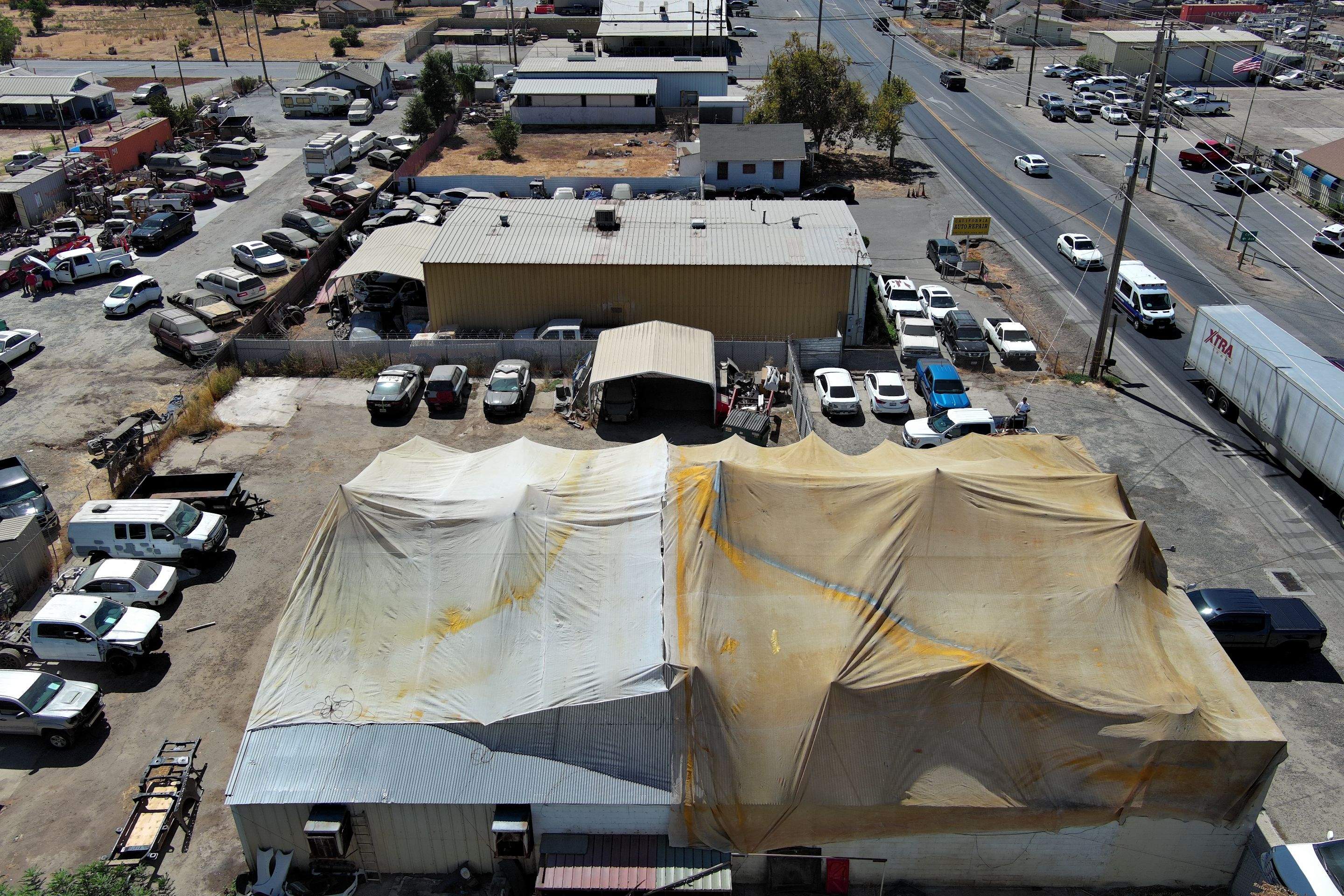 Spray foam and coatings using Conklin Benchmark/ PUMA XL acrylic coatings over metal and foam by Straight Edge Roofing Inc