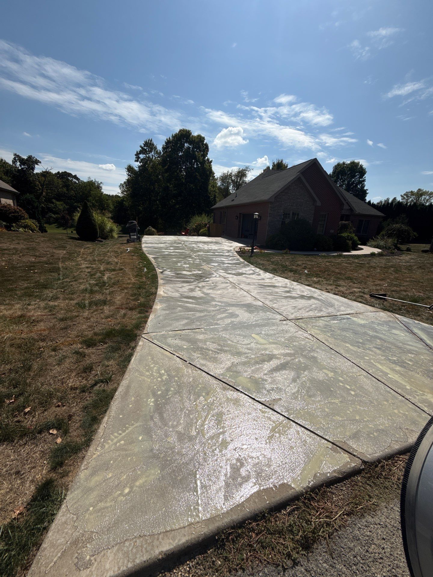 Driveway + Garage + Walkway Project in Meridian by Floors in a Day, Inc