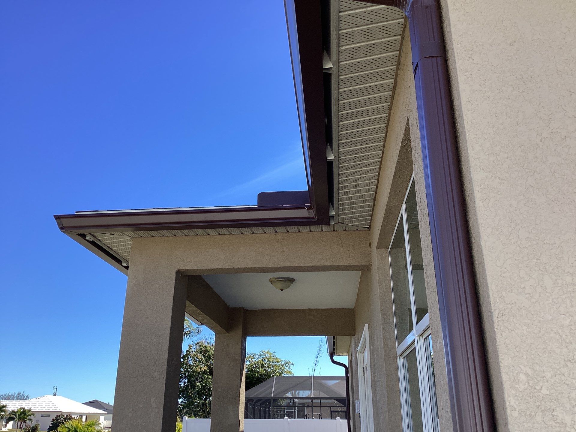 Royal Brown Seamless Gutters in Cape Coral FL by Gutter Professors