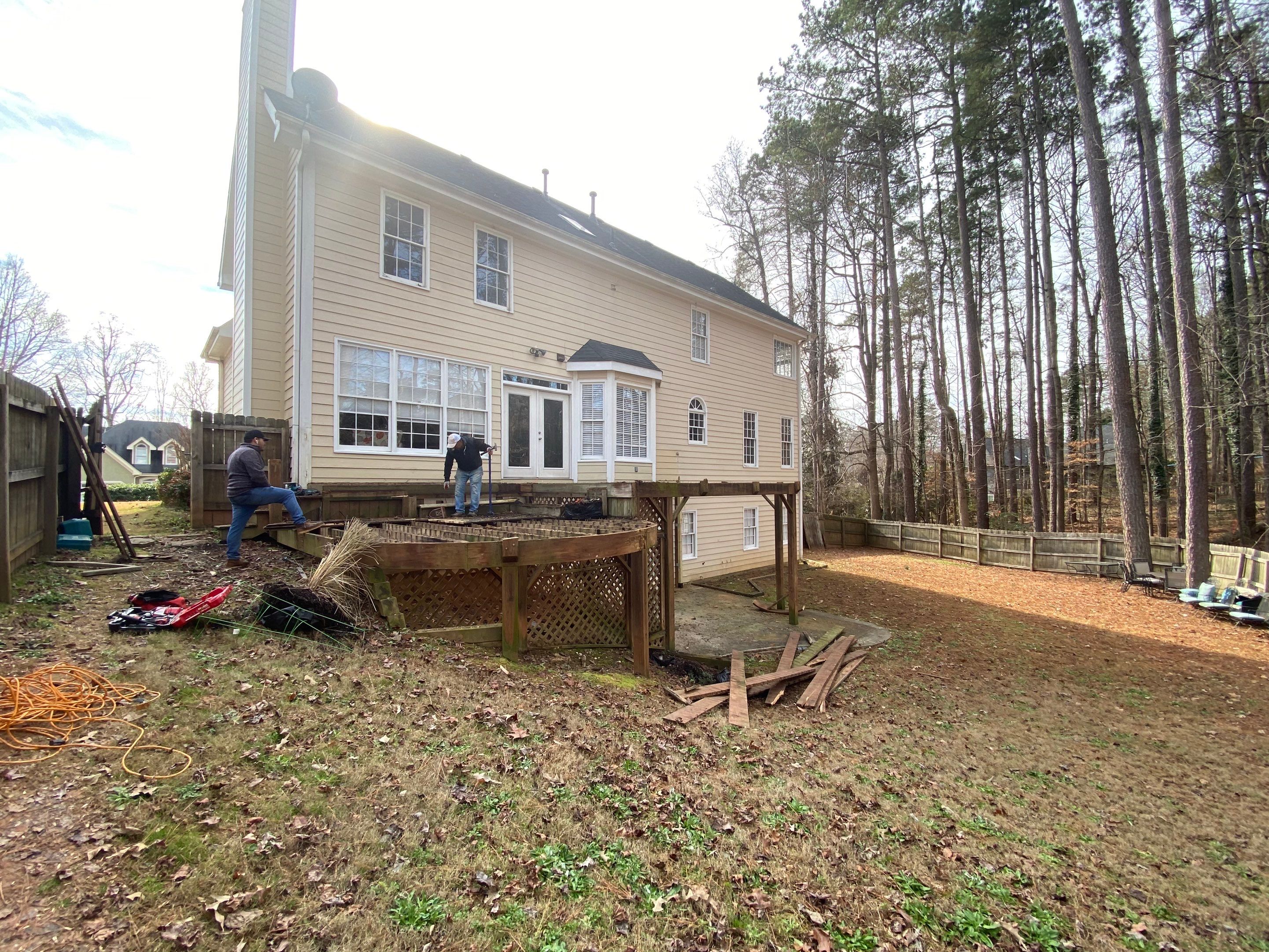 Elevated Pressure-Treated Wood Deck Replacement and Staircase in Duluth by Swift Home Renovations