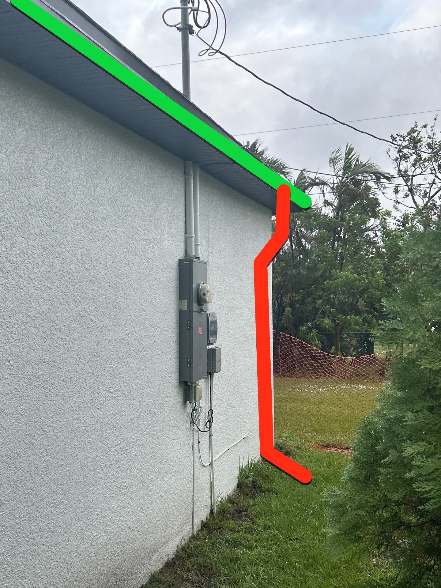 Dark Seamless Gutters and Downspouts in Cape Coral FL by Gutter Professors