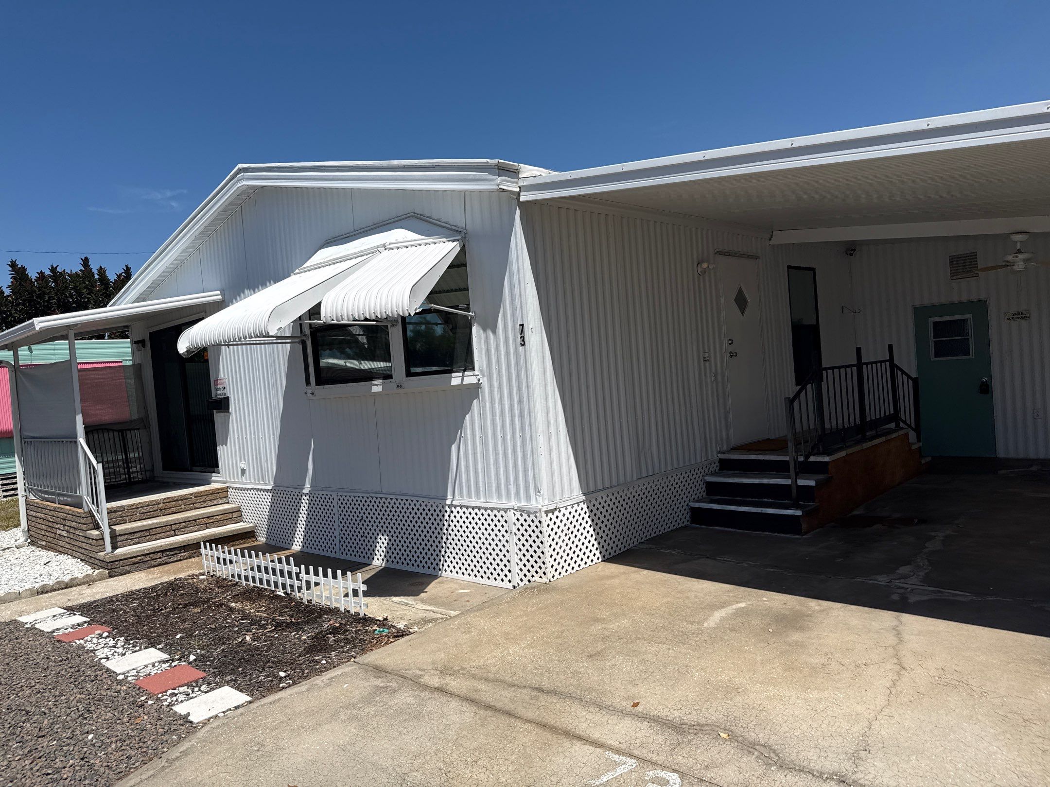 Mobile Home Soft Wash & TPO Roof Cleaning in Plaza Estates – Bradenton, FL by Sunshine AquaWash